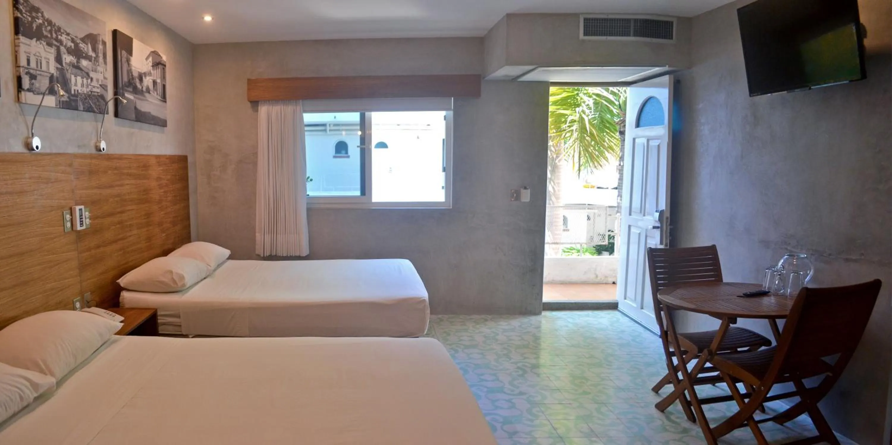 Photo of the whole room, Bed in Hotel Rio Malecon