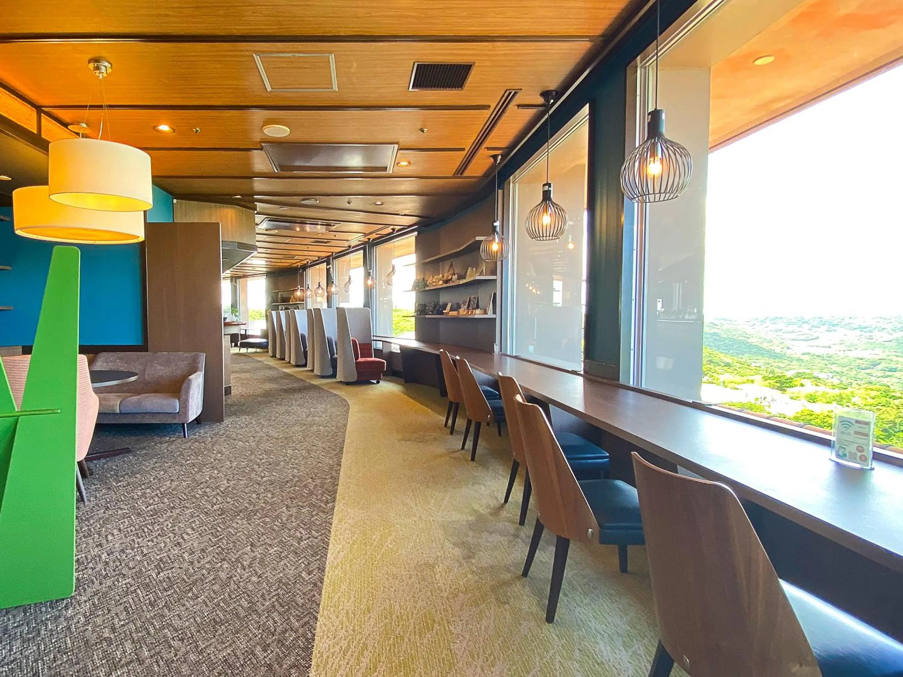 Communal lounge/ TV room in The Yuinchi Hotel Nanjo