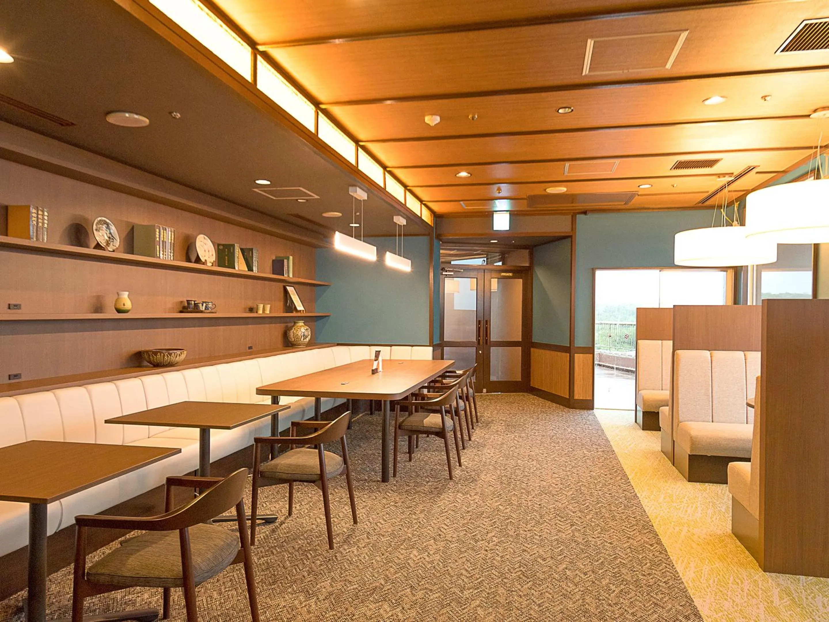 Communal lounge/ TV room in The Yuinchi Hotel Nanjo