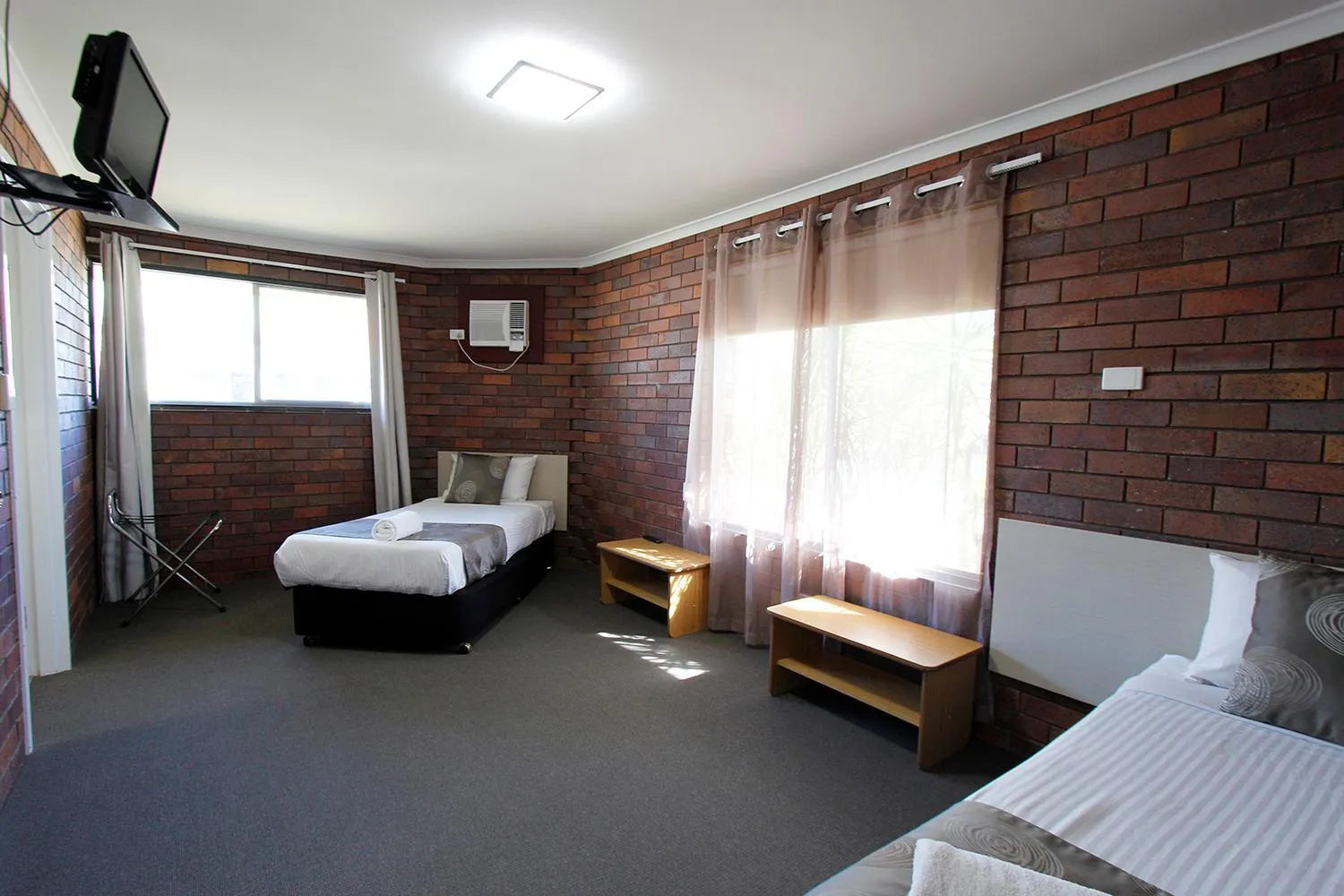 Bed in Blue Shades Motel