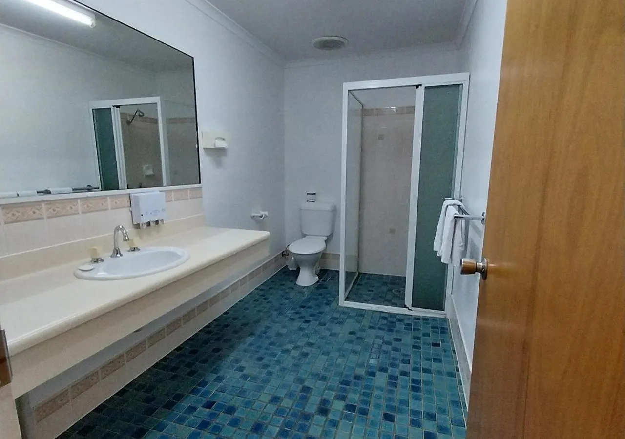 Shower in Blue Shades Motel