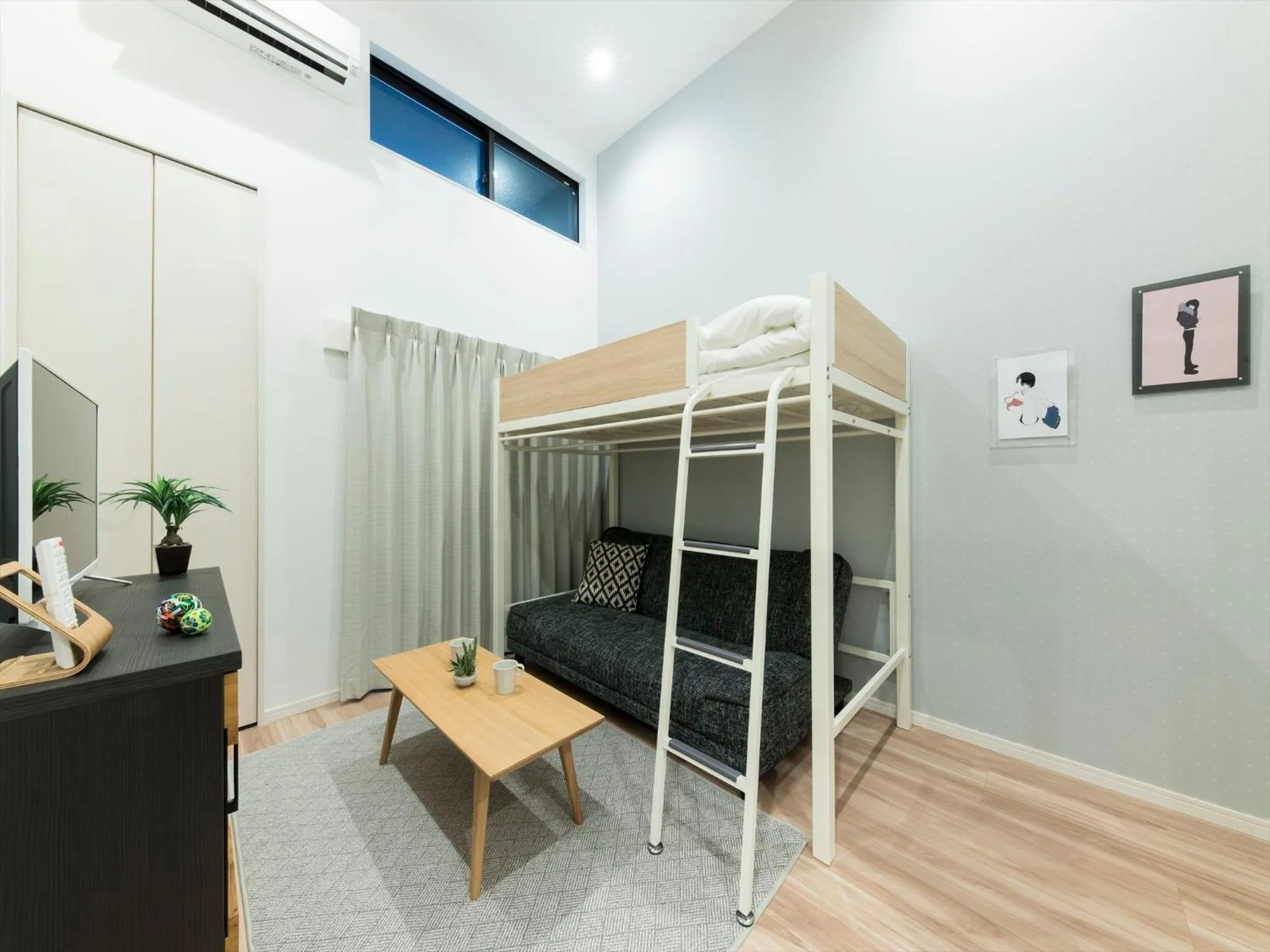 Living room, Bed in TRIP POD SUMIYOSHI C