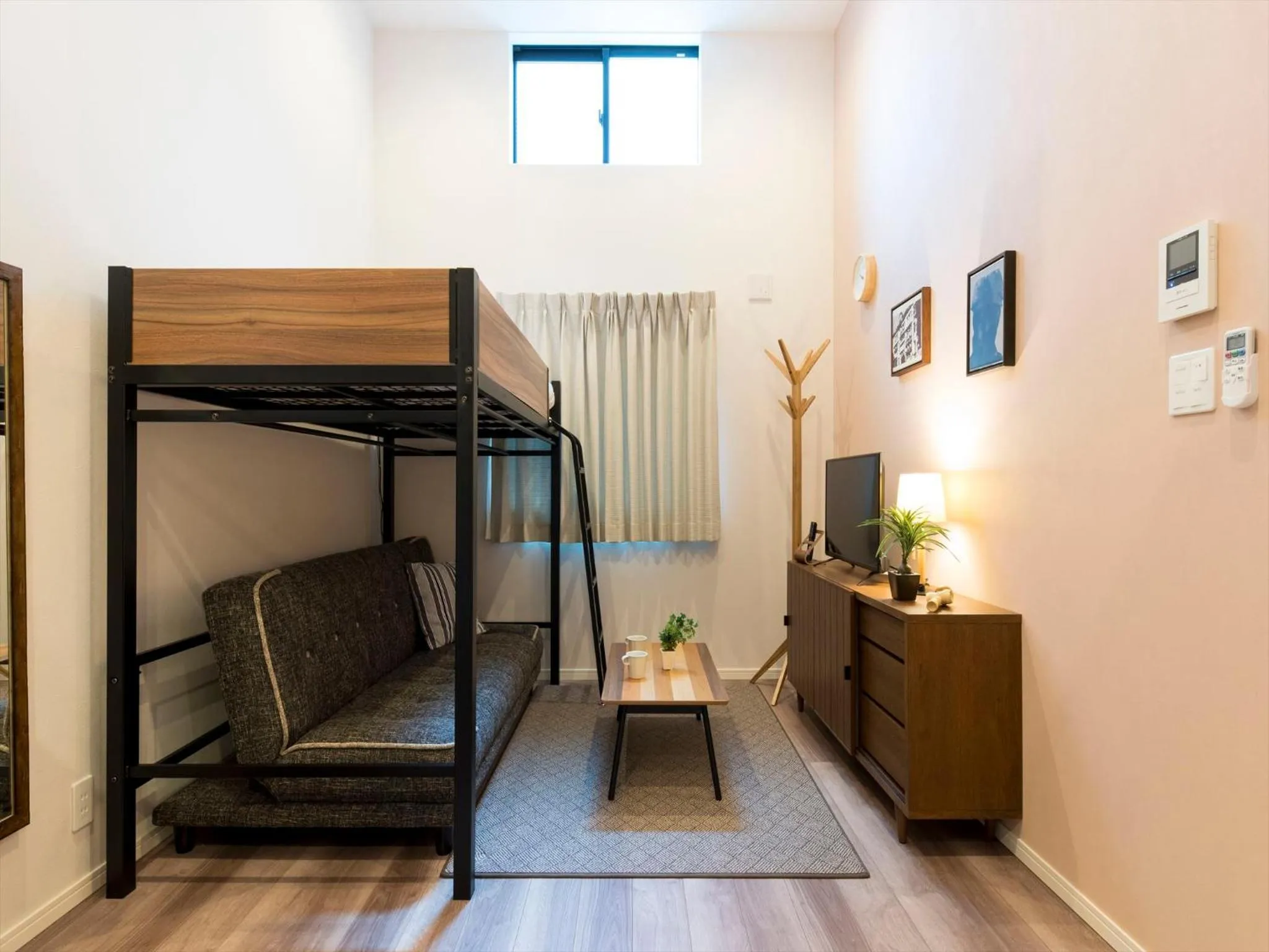 Living room in TRIP POD TOJIN-MACHI A