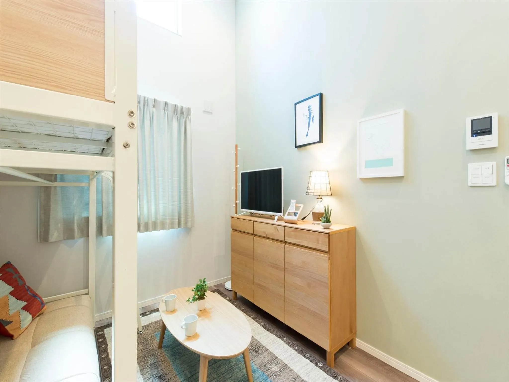 Living room, Bed in TRIP POD TOJIN-MACHI A