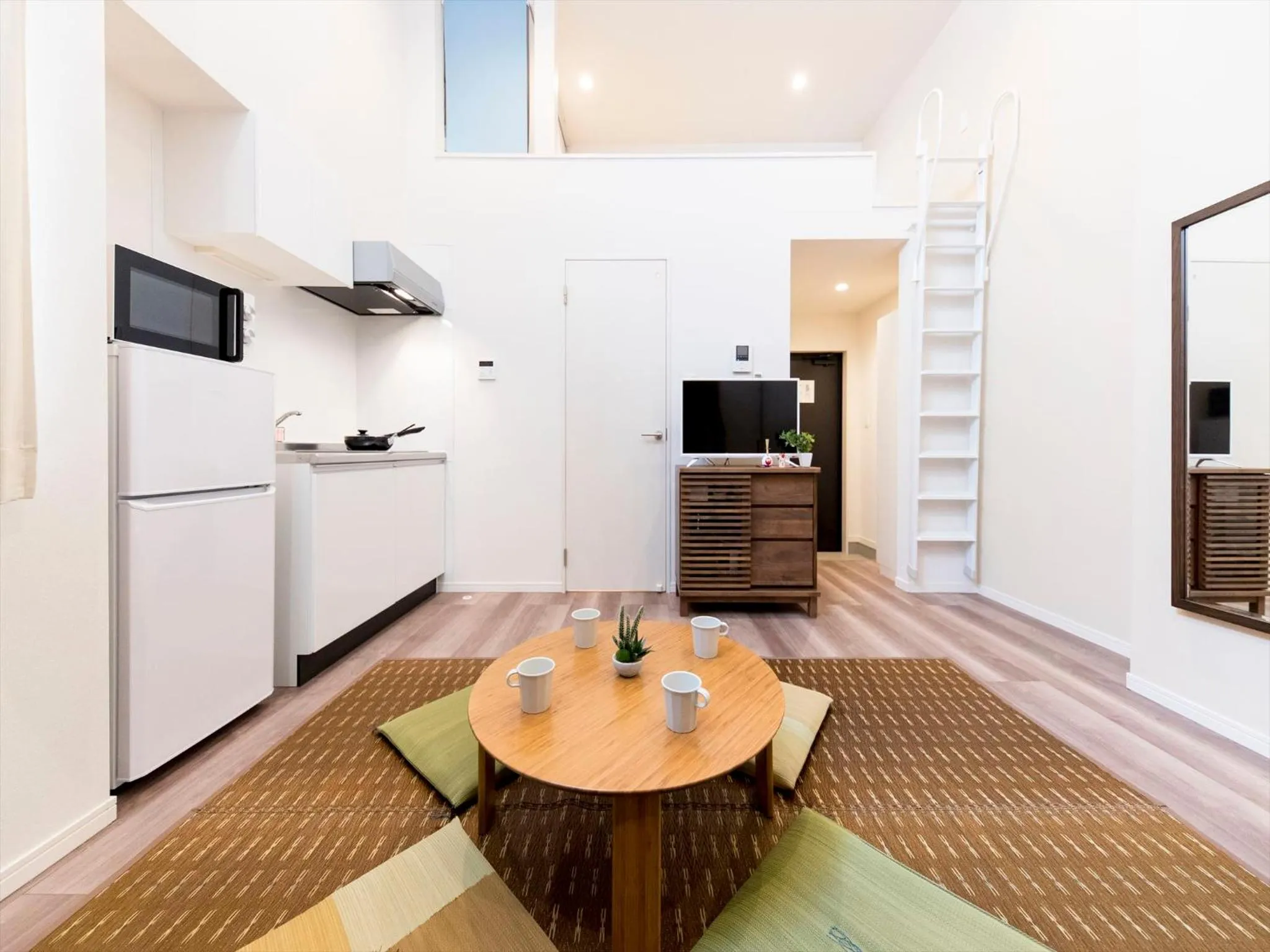 Living room in TRIP POD TOJIN-MACHI A