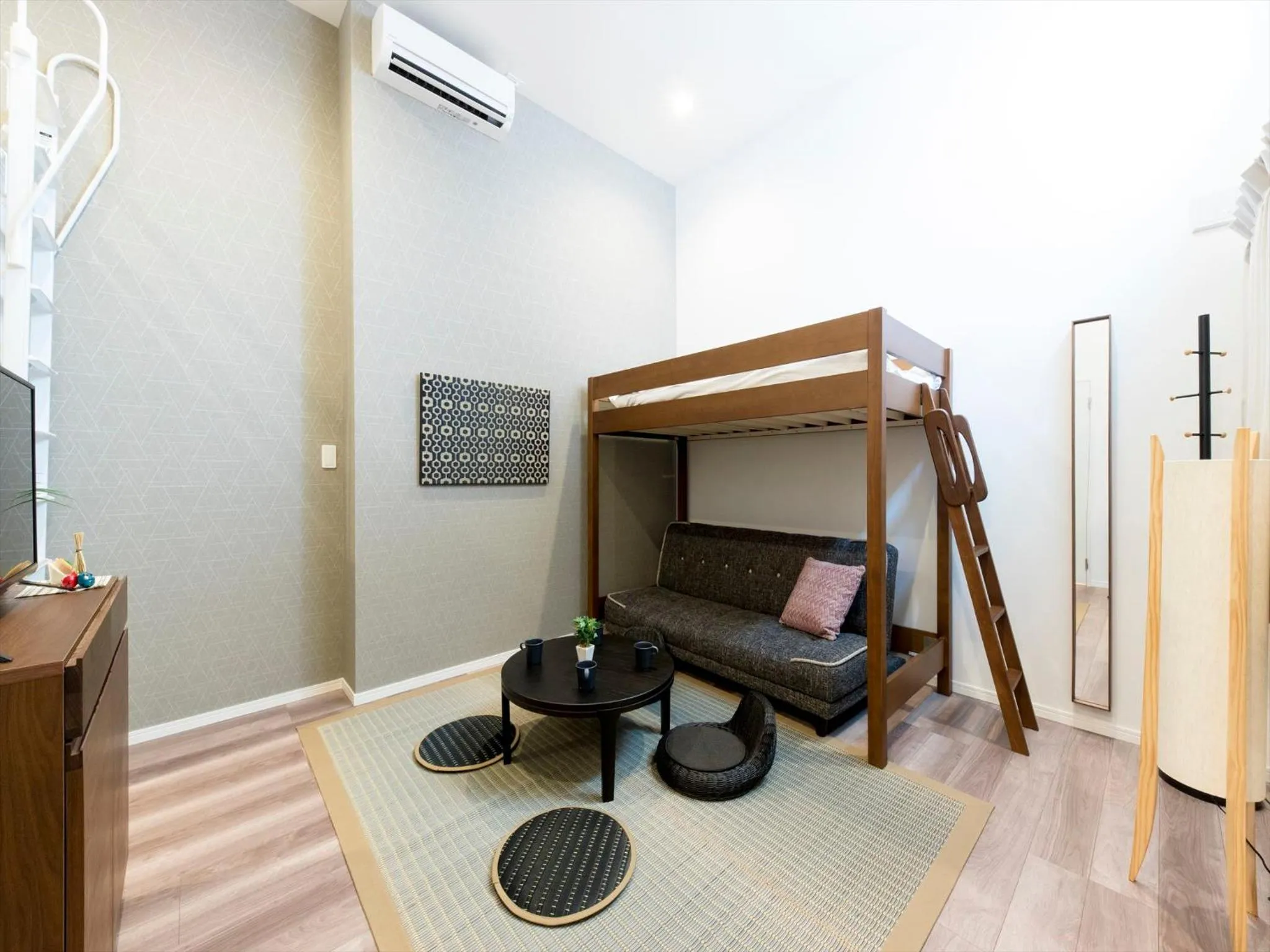 Living room in TRIP POD TOJIN-MACHI A
