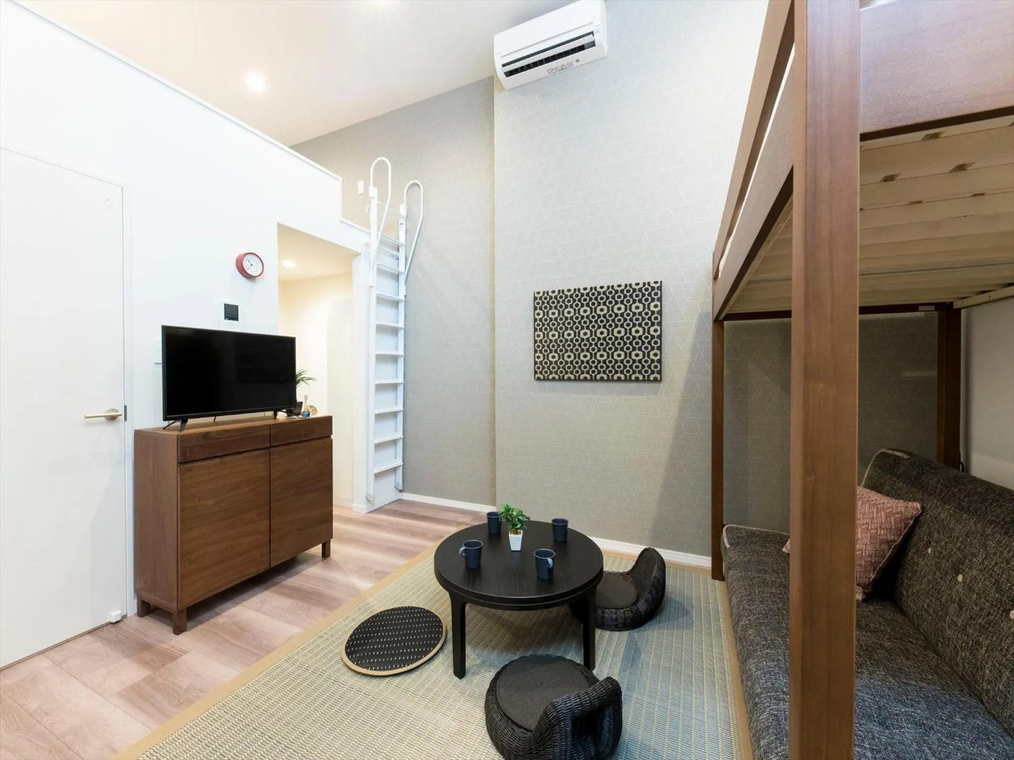 Living room in TRIP POD TOJIN-MACHI A