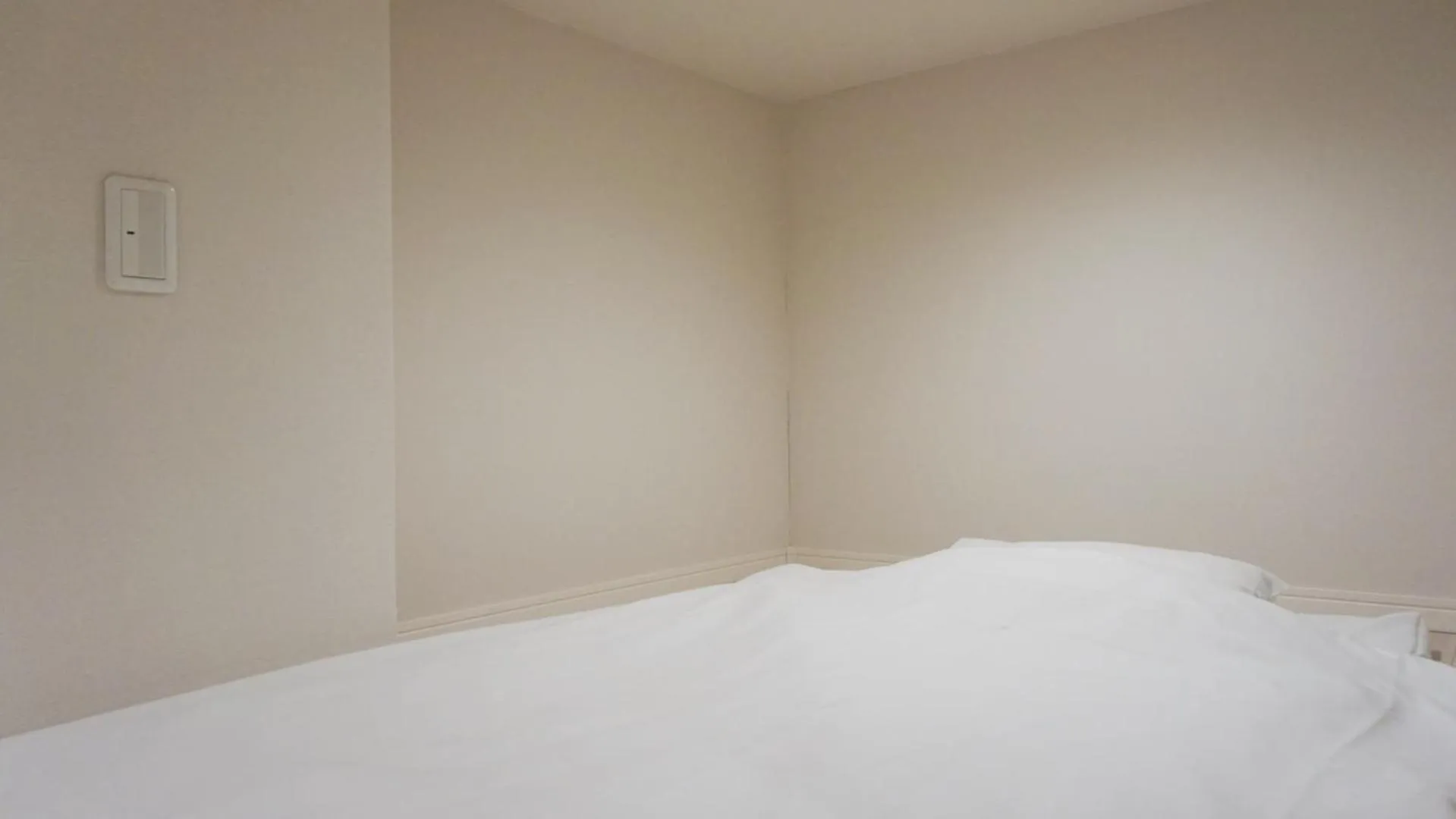 Bed in TRIP POD SUMIYOSHI A