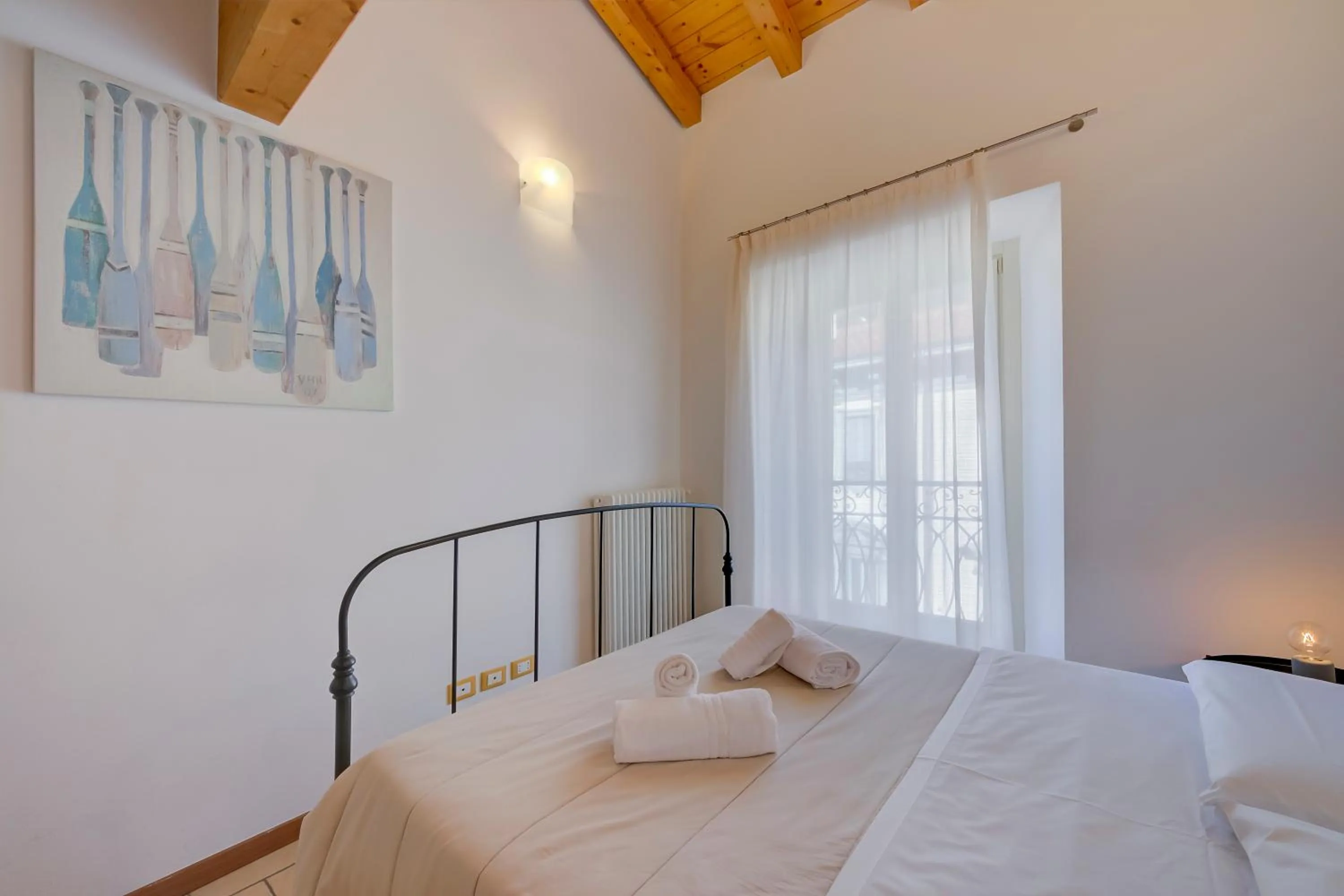 Bedroom, Bed in Le Stanze del Lago Apartments