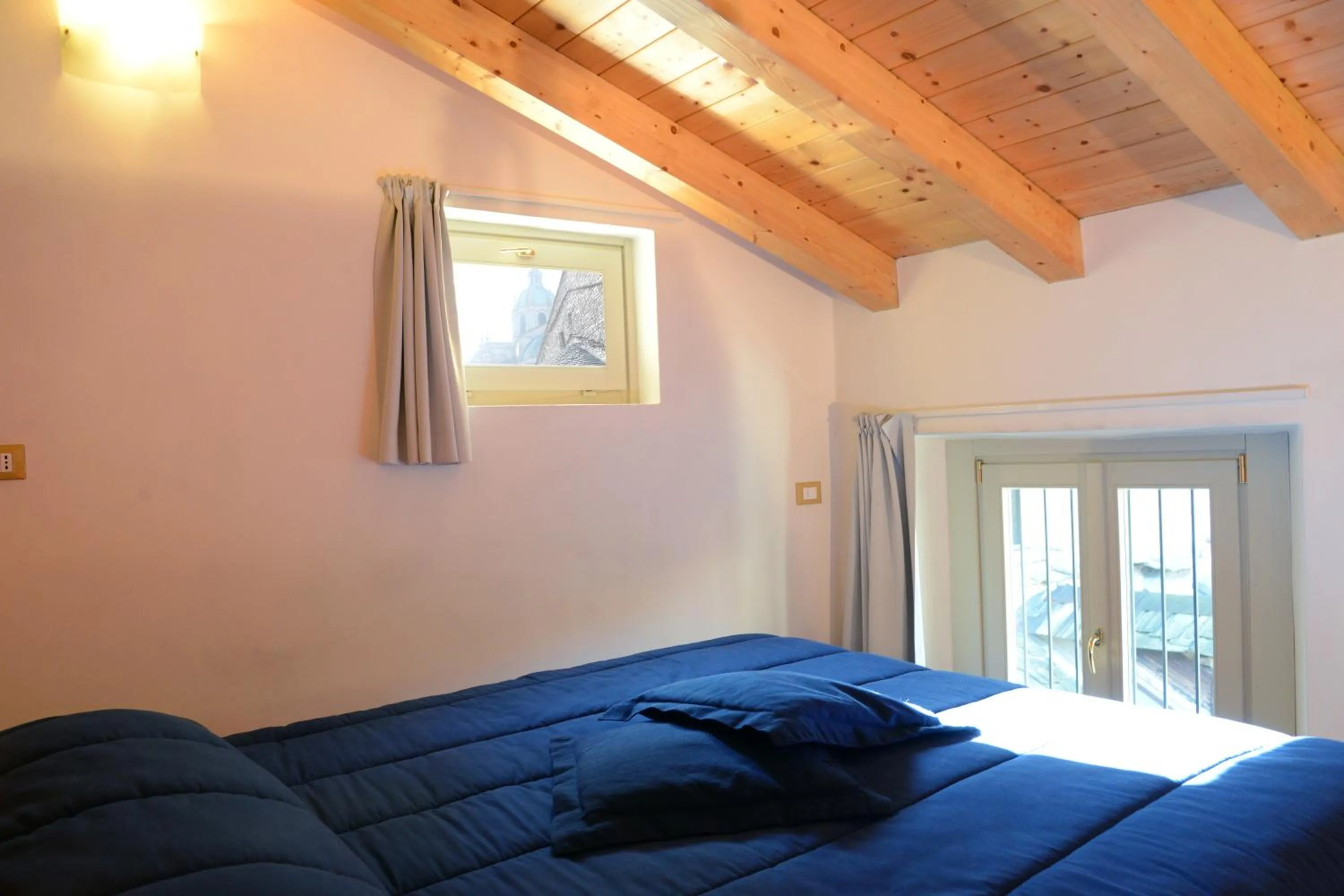 Bedroom, Bed in Le Stanze del Lago Apartments