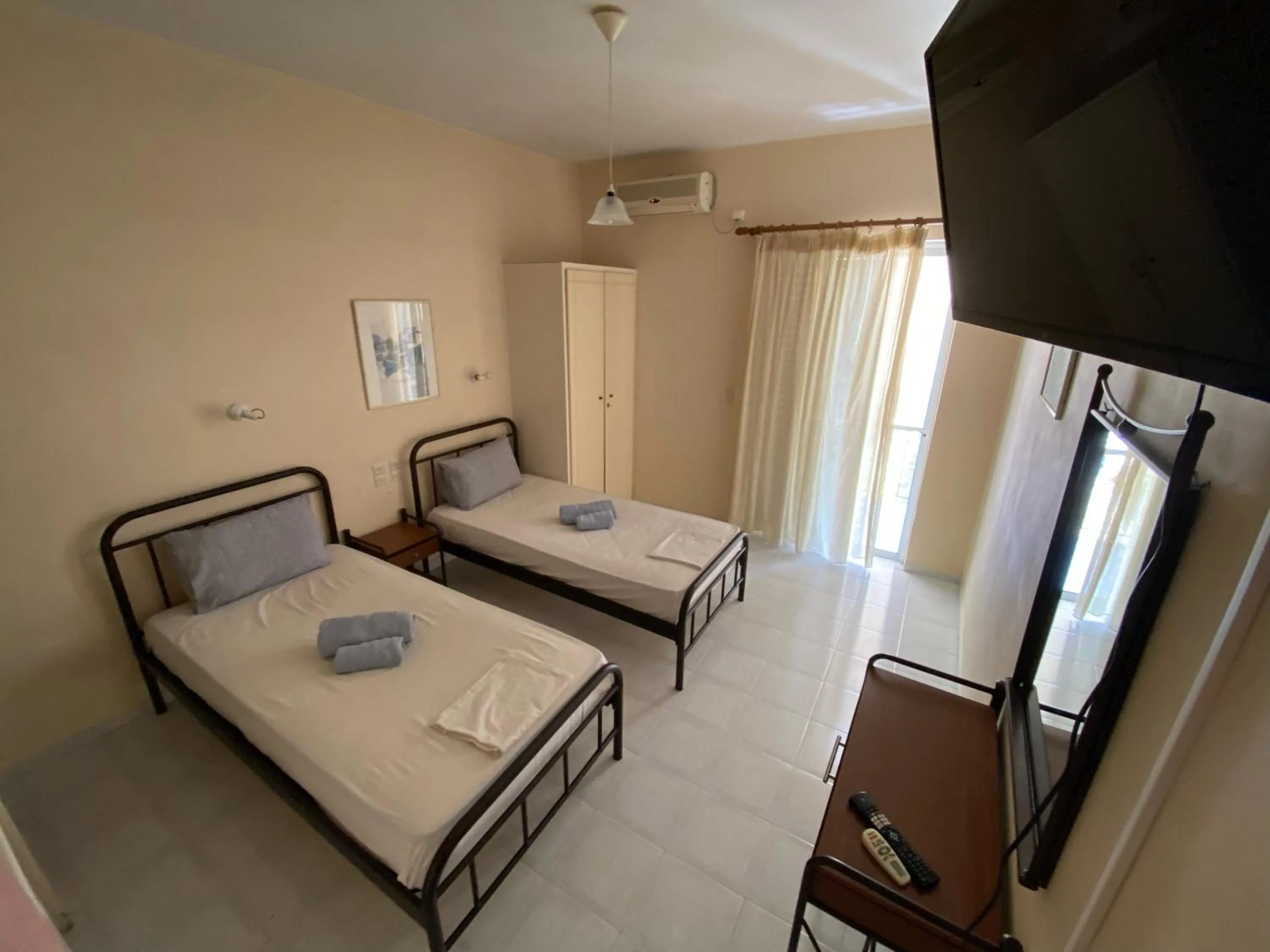 Bed in Polyxenis Rooms