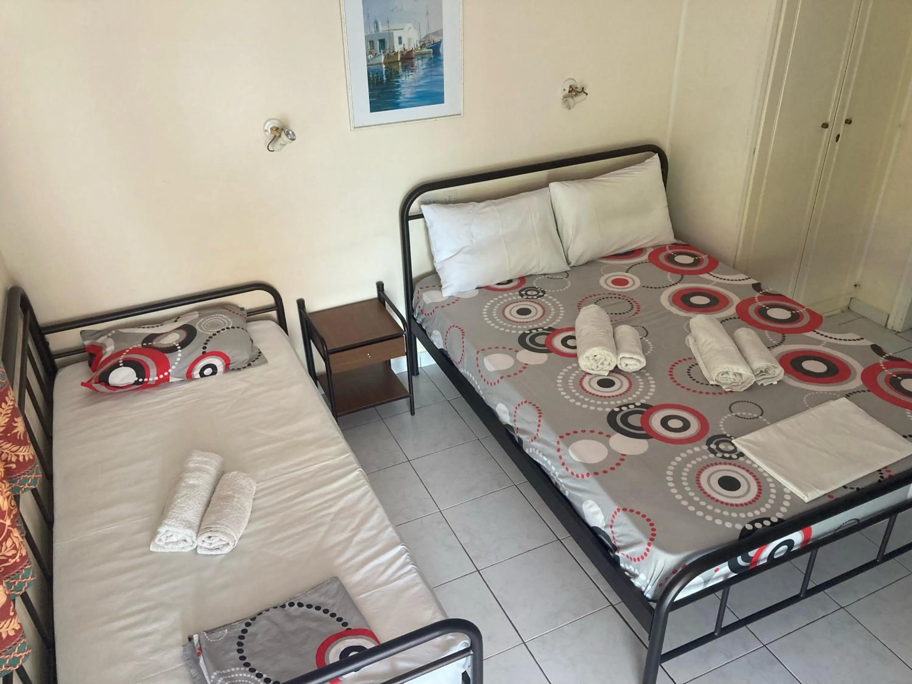 Bed in Polyxenis Rooms