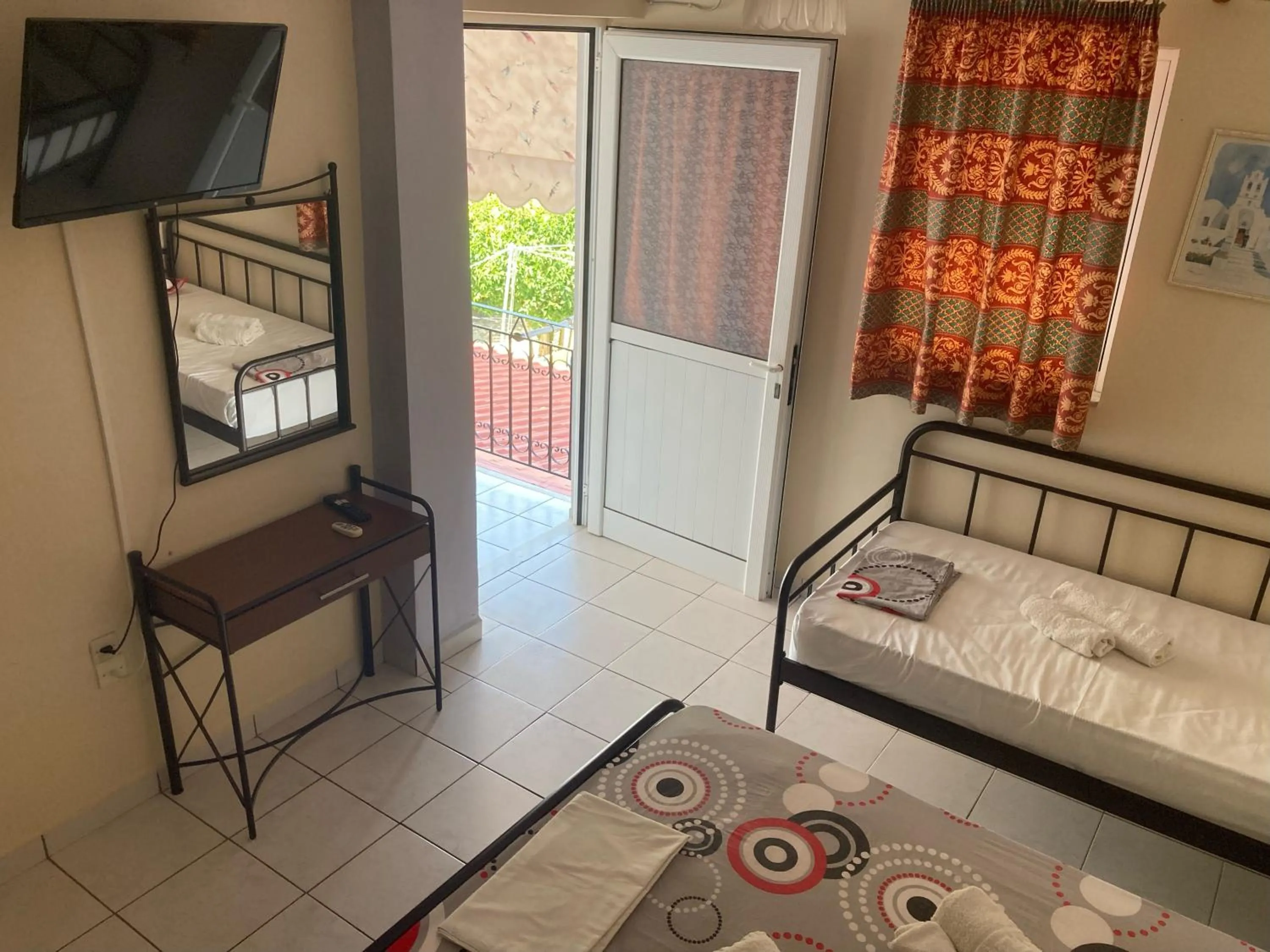 Bed in Polyxenis Rooms