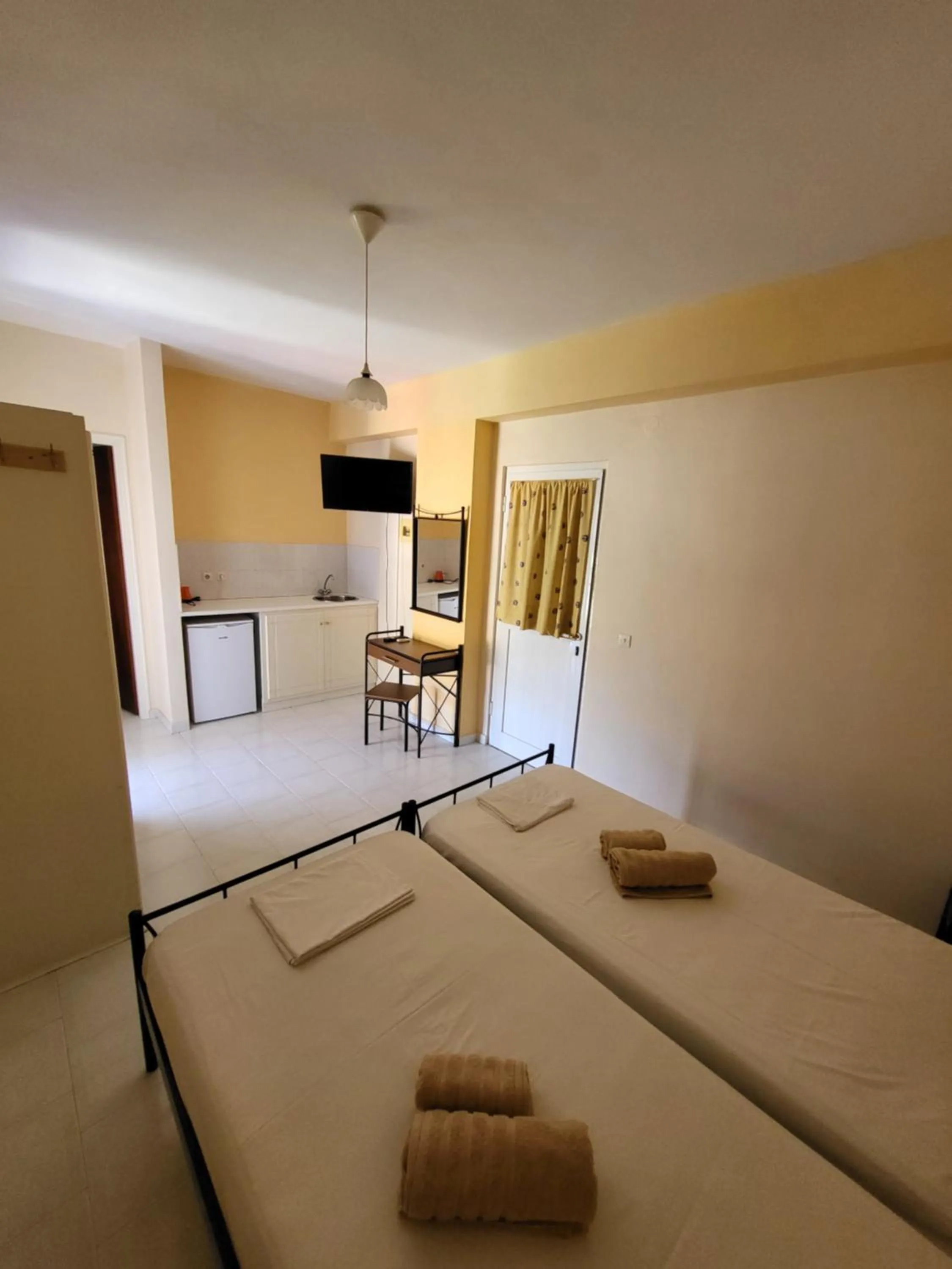 Bed in Polyxenis Rooms