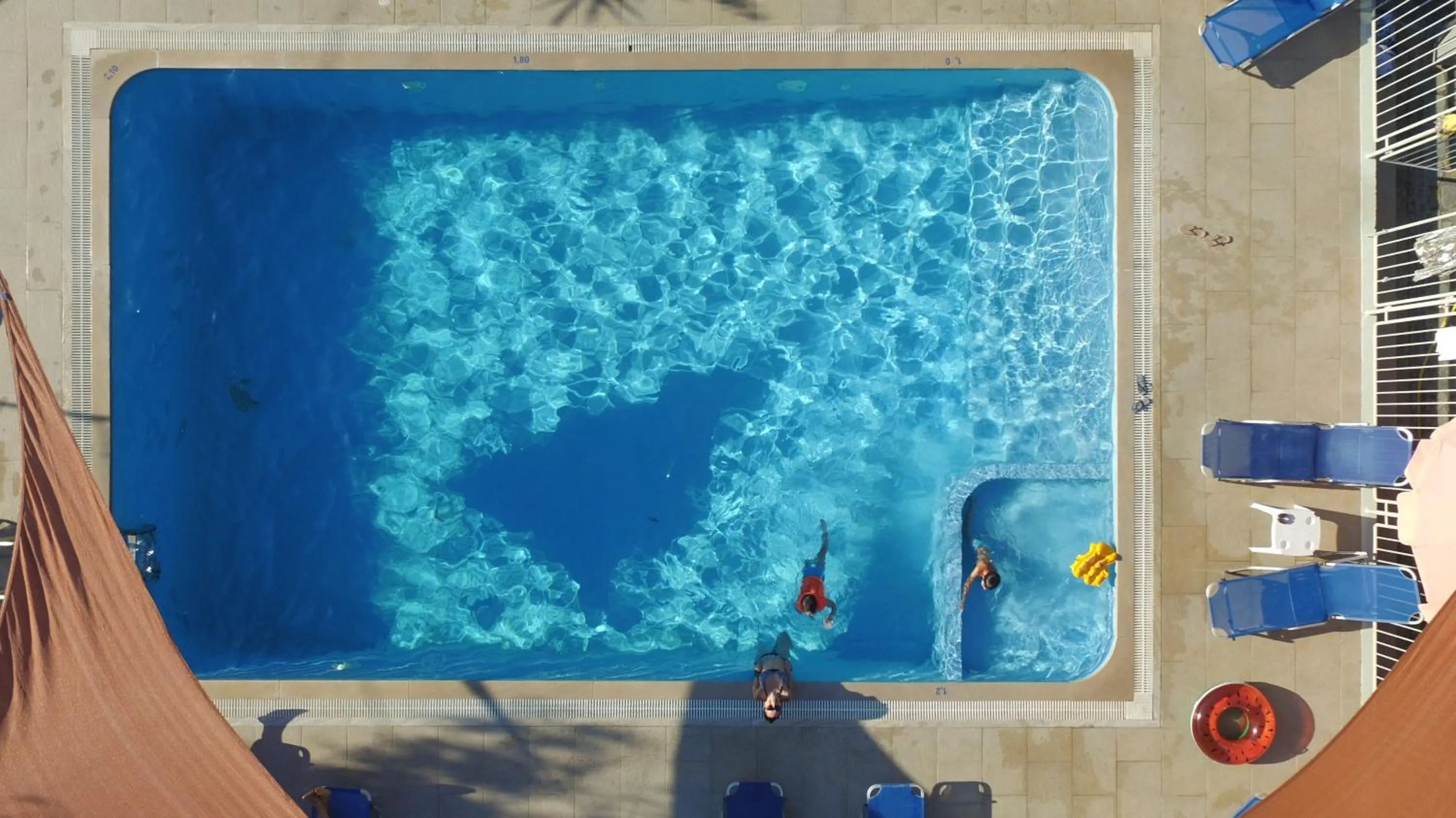 Swimming pool in Polyxenis Rooms