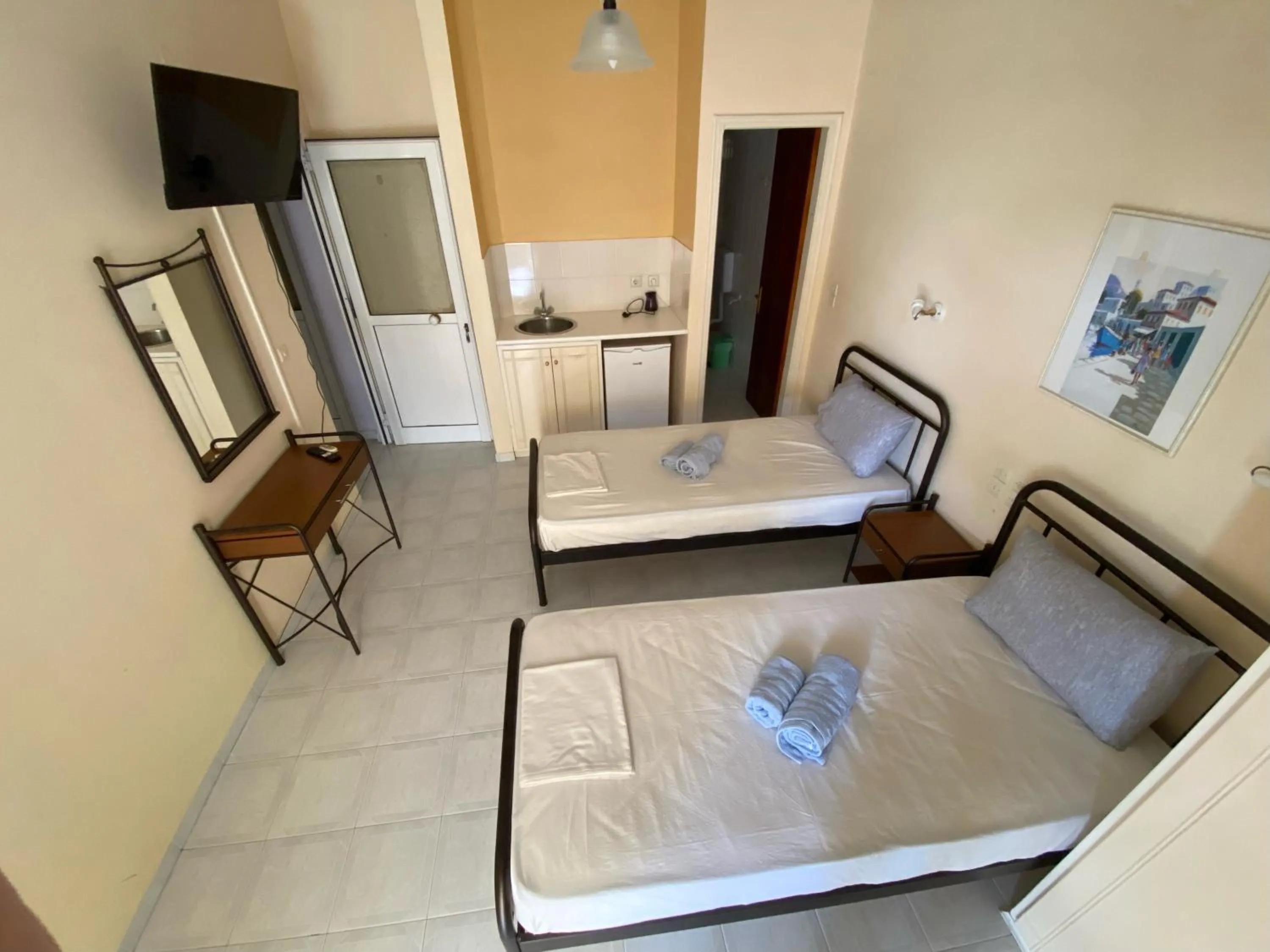 Bed in Polyxenis Rooms