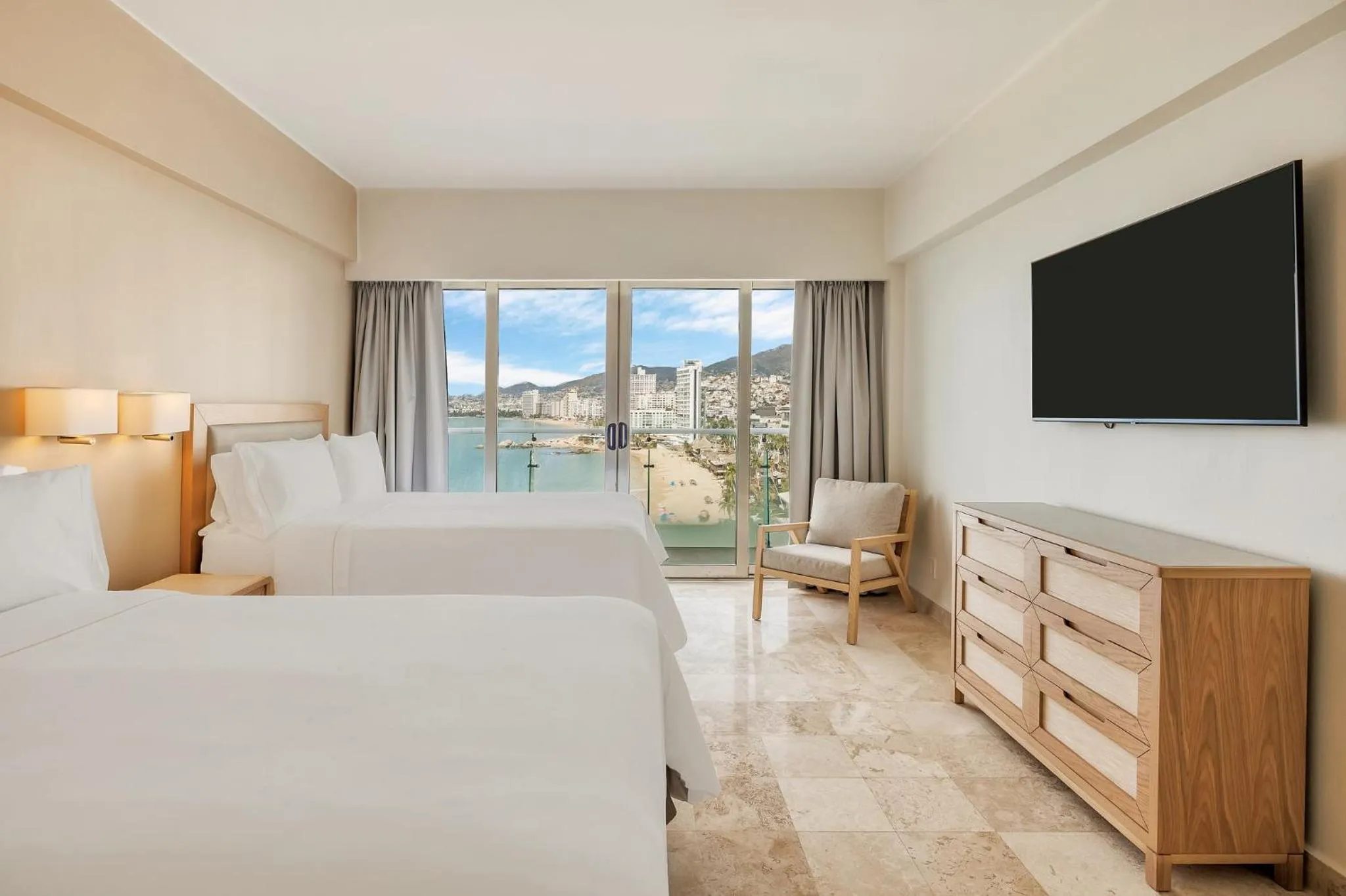 Photo of the whole room, Bed in Fiesta Americana Acapulco Villas