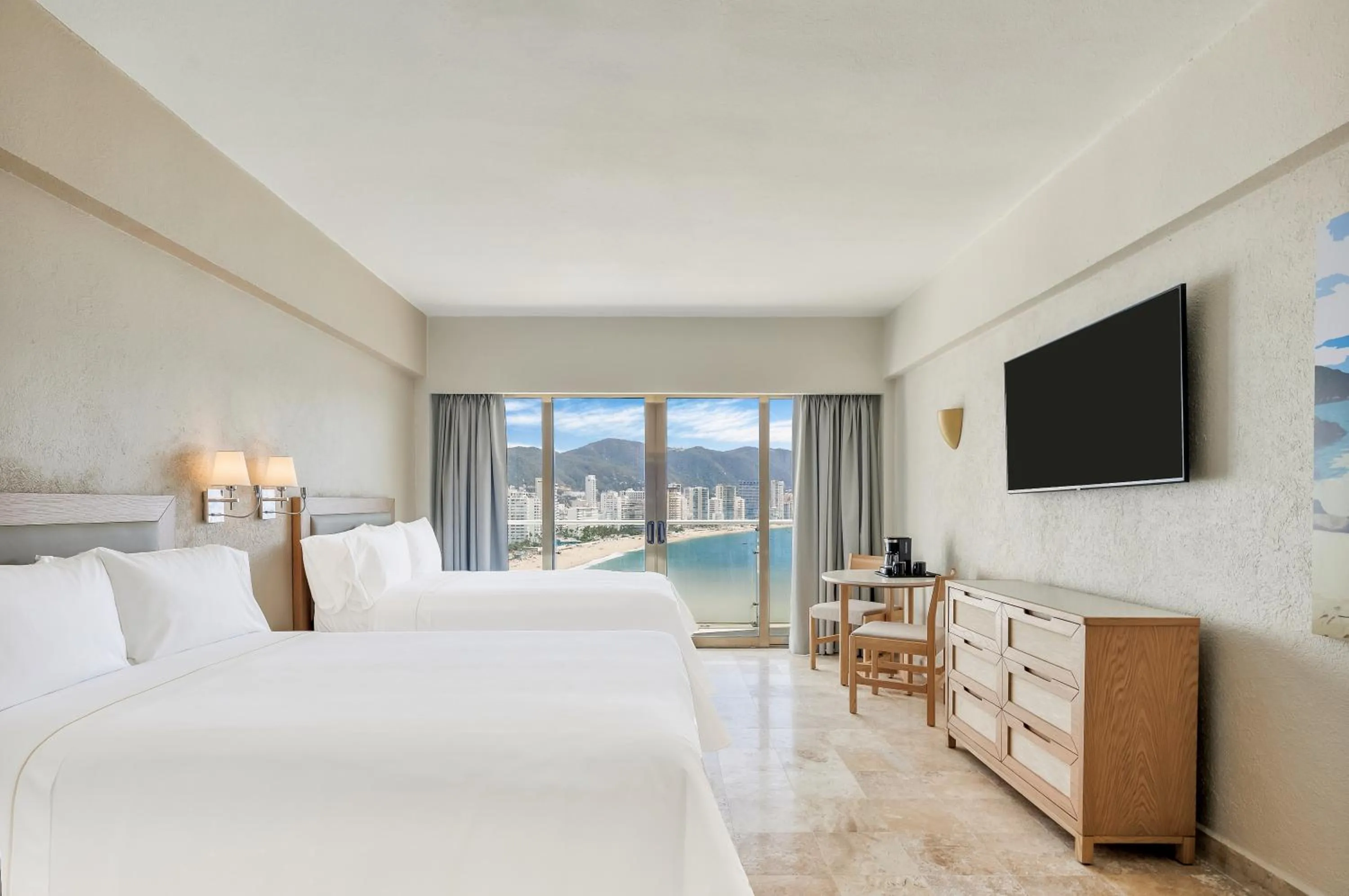 Bed in Fiesta Americana Acapulco Villas