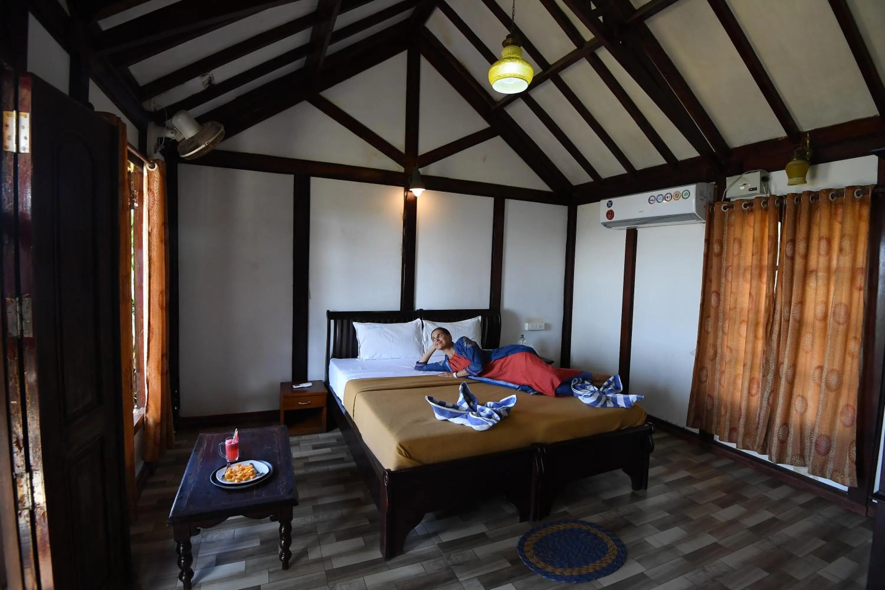 Bed in Blue Water Beach Resort