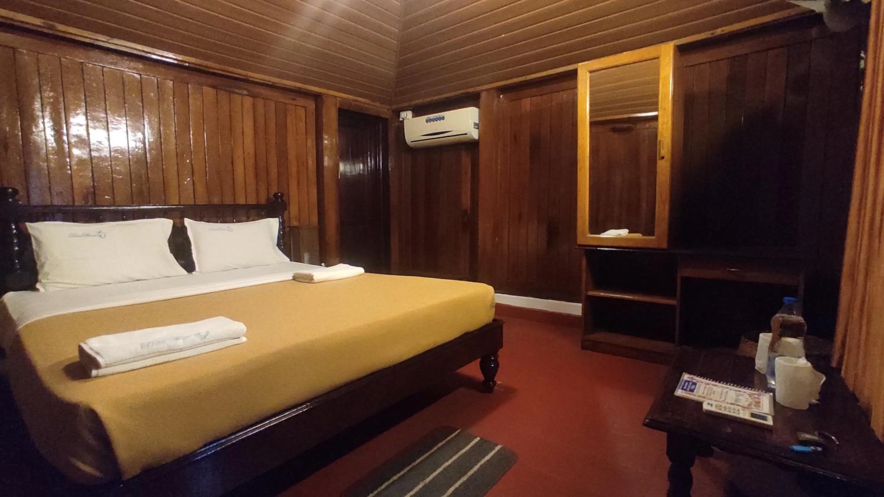 Bed in Blue Water Beach Resort