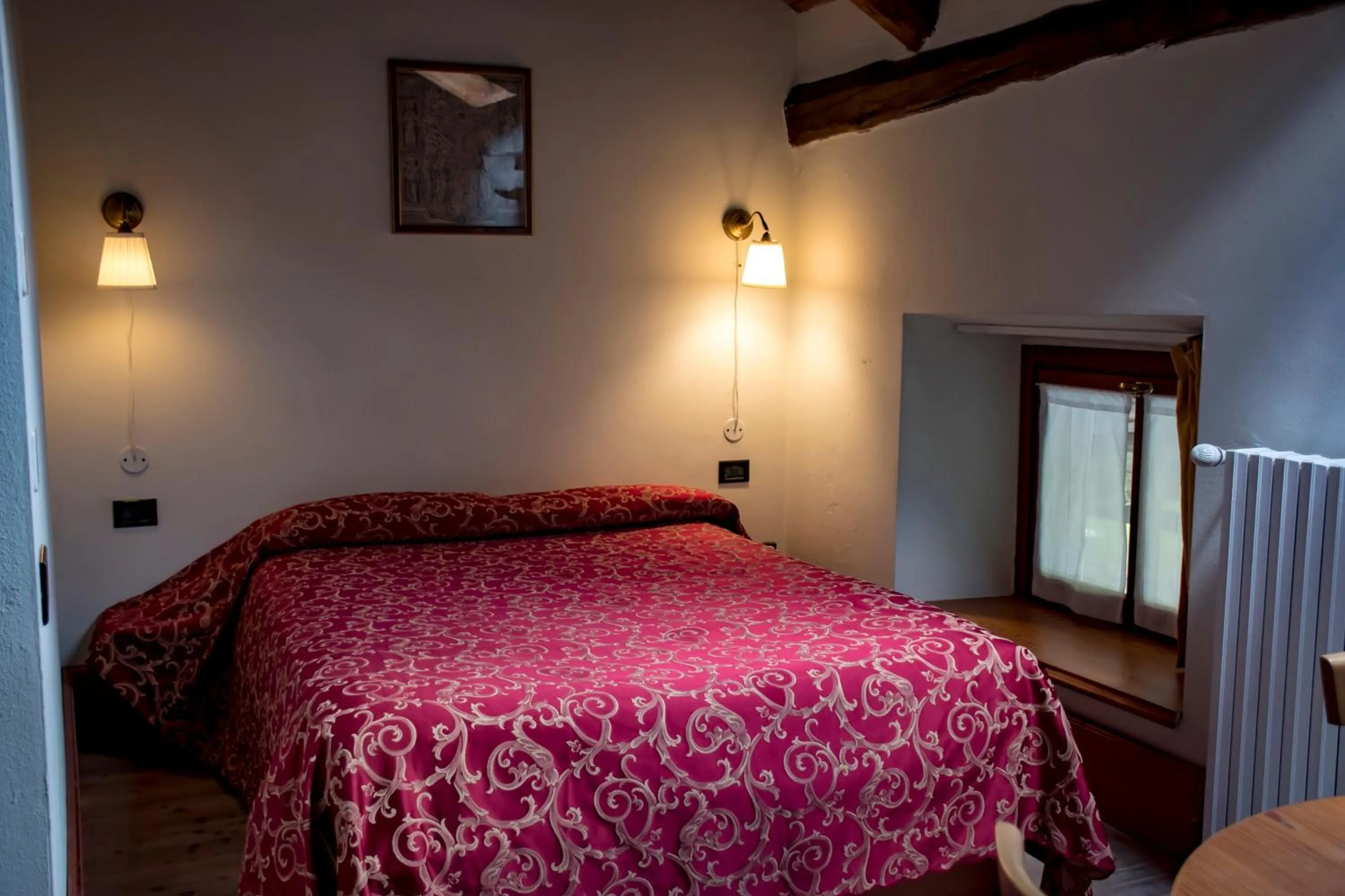 Bed in Hotel La Villa della Regina