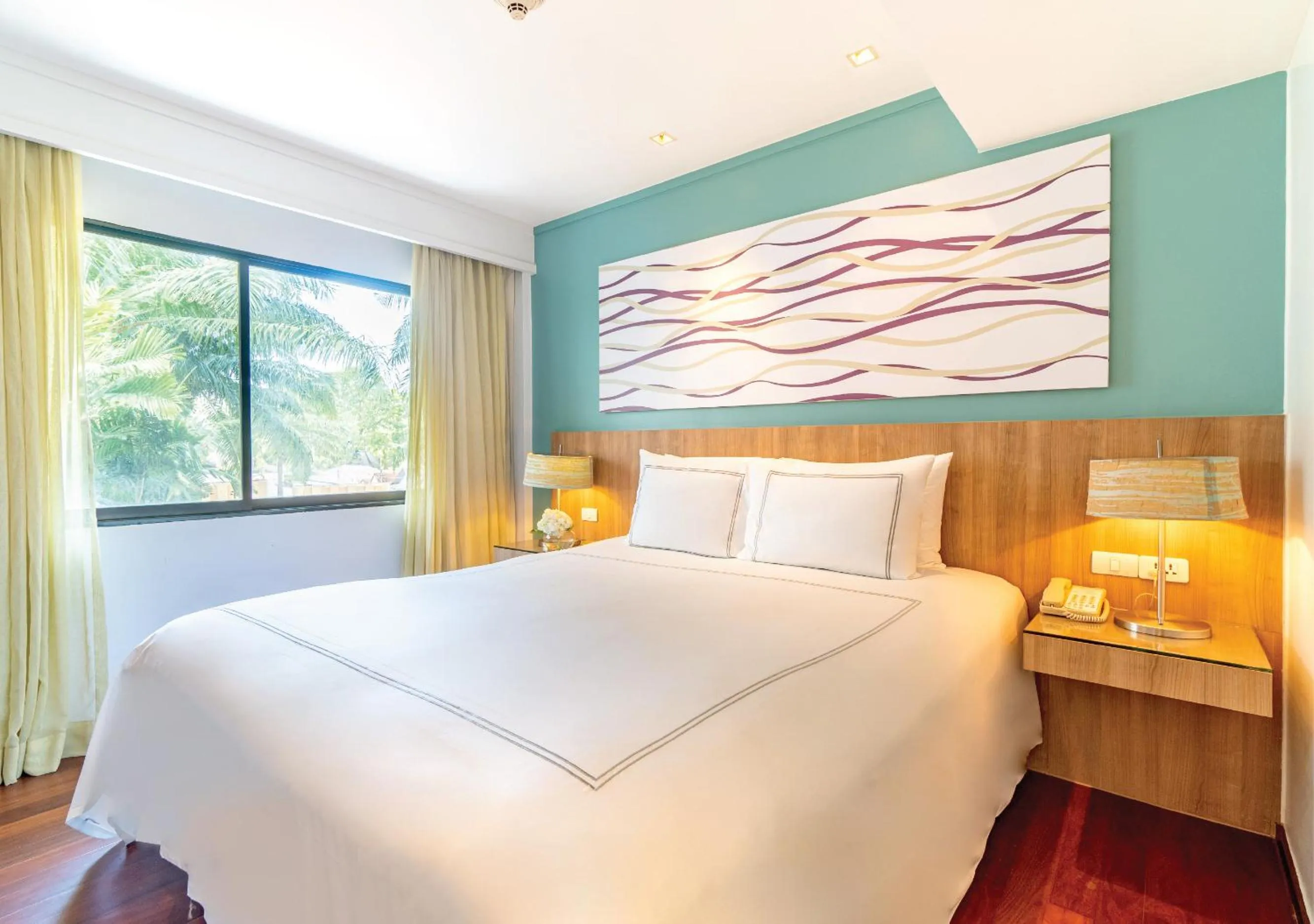 Bedroom, Bed in Radisson Resort and Suites Phuket