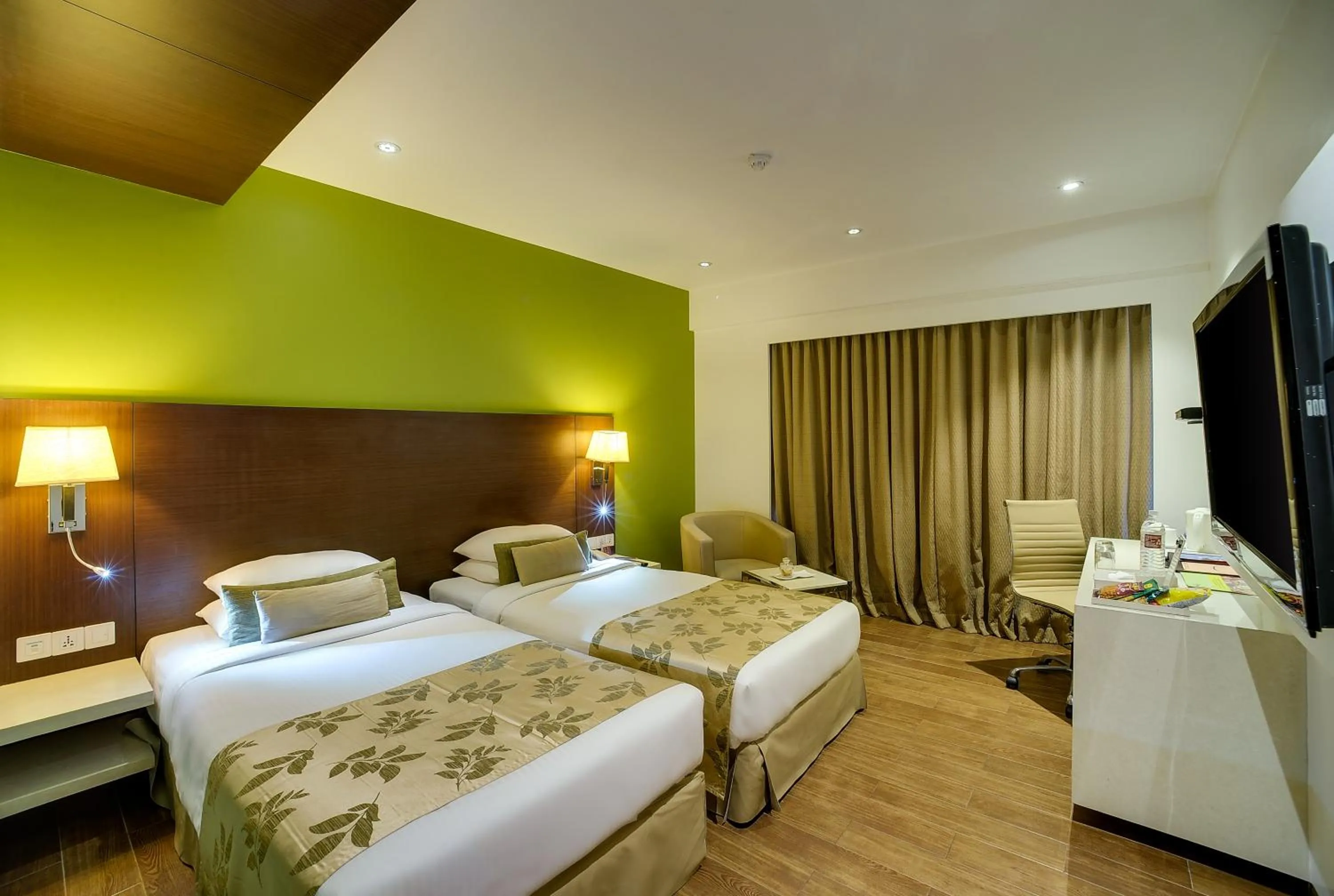 Bedroom, Bed in Ramee Grand Hotel and Spa, Pune