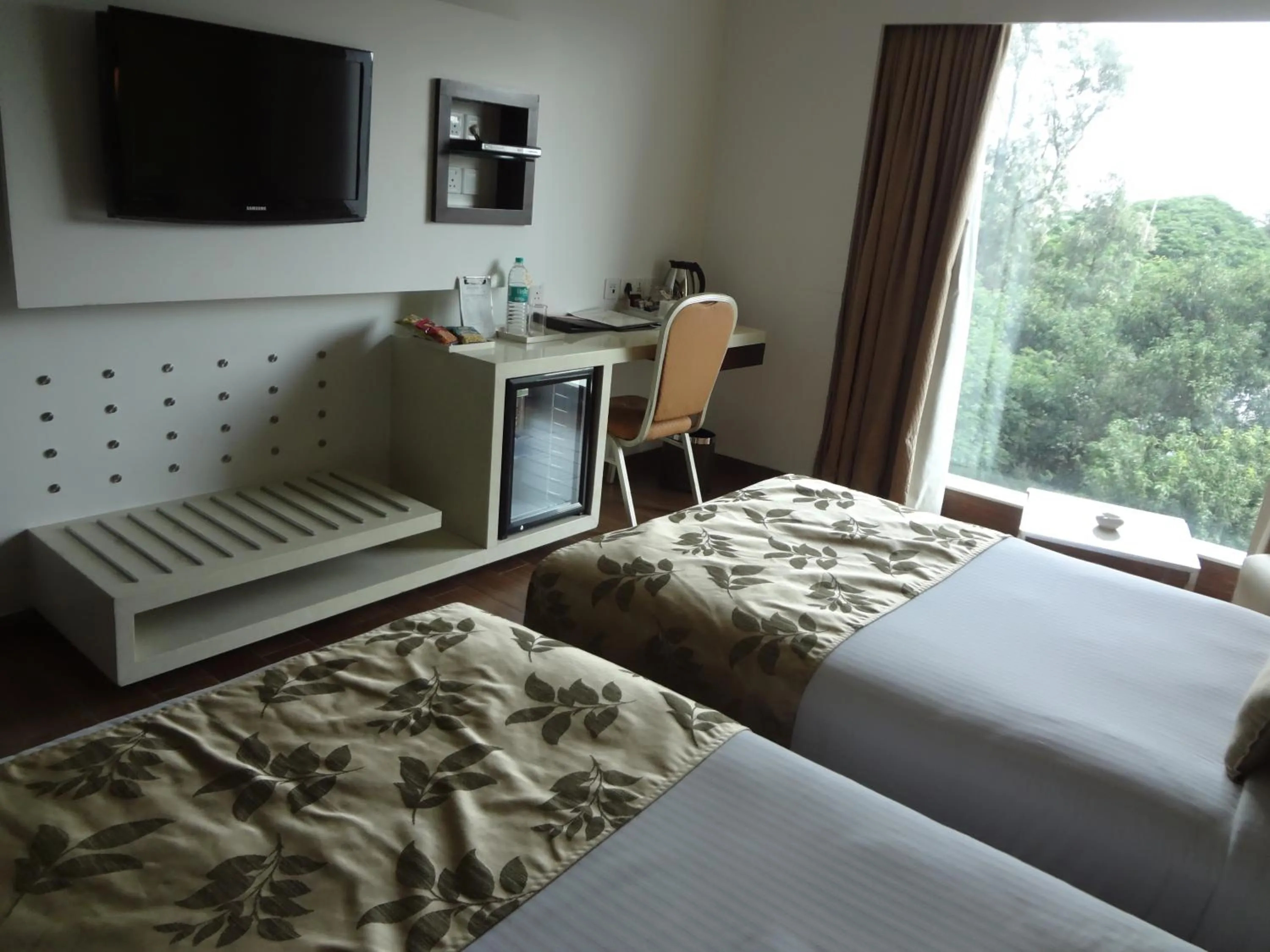 Bed in Ramee Grand Hotel and Spa, Pune