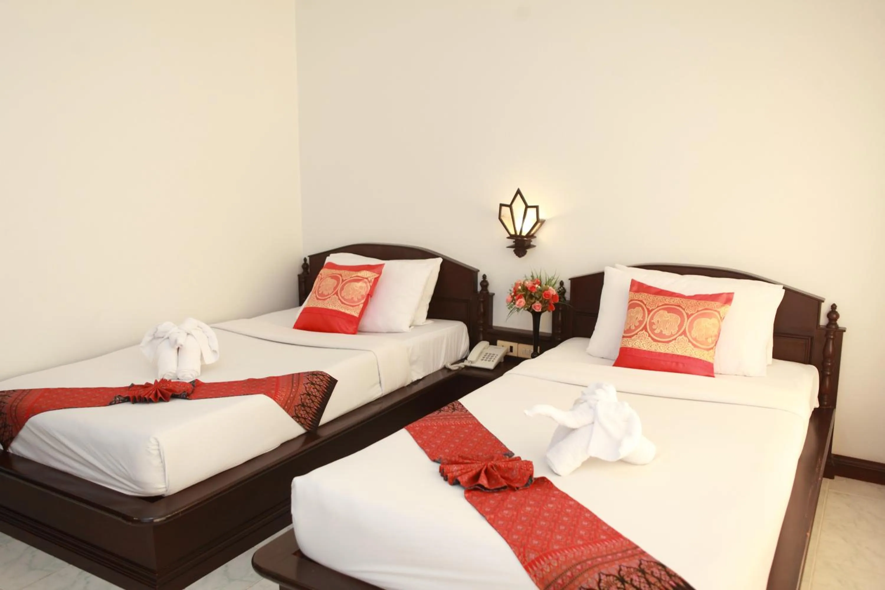 Bed in Samui First House Hotel