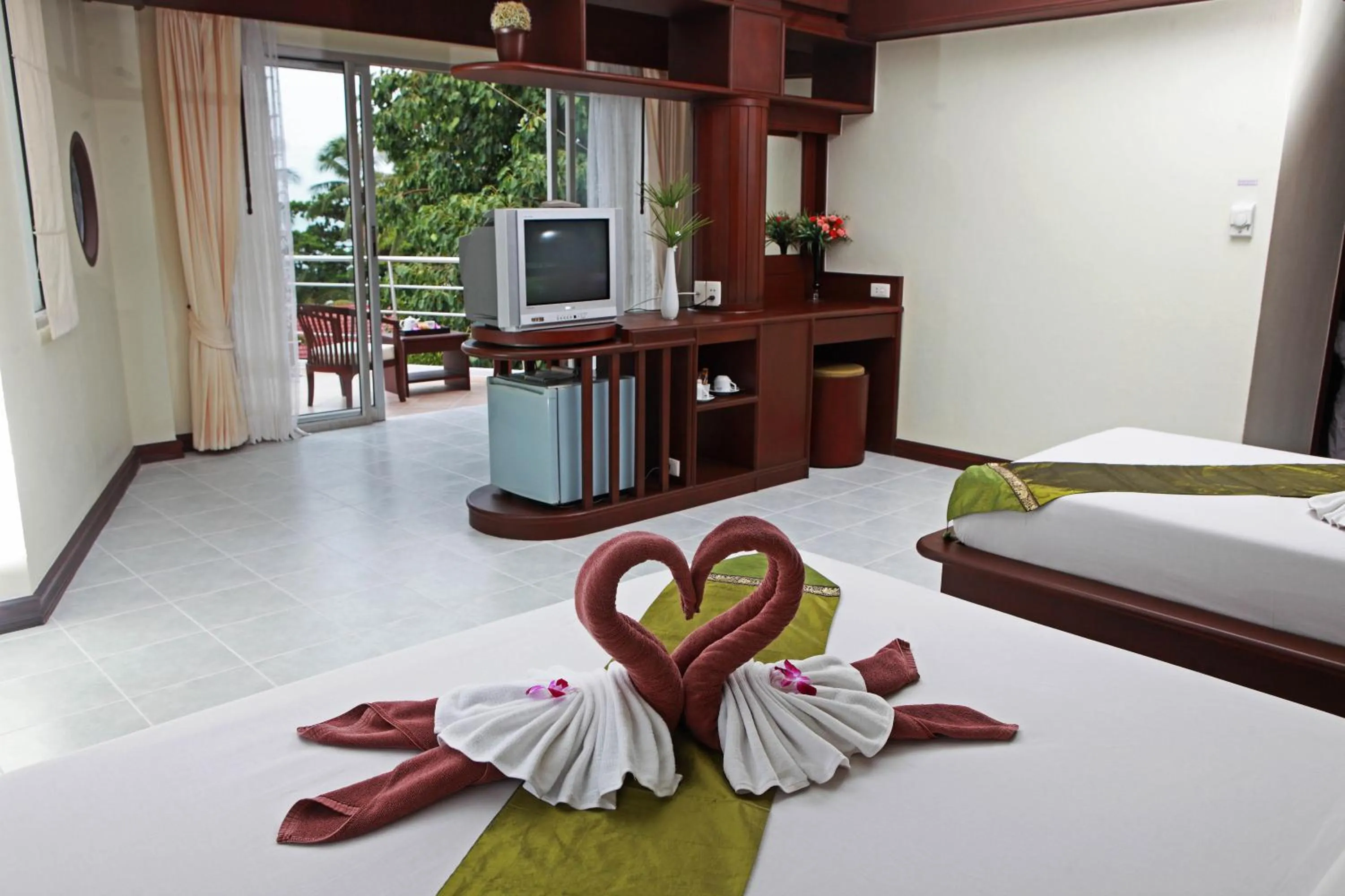 Photo of the whole room, Bed in Samui First House Hotel