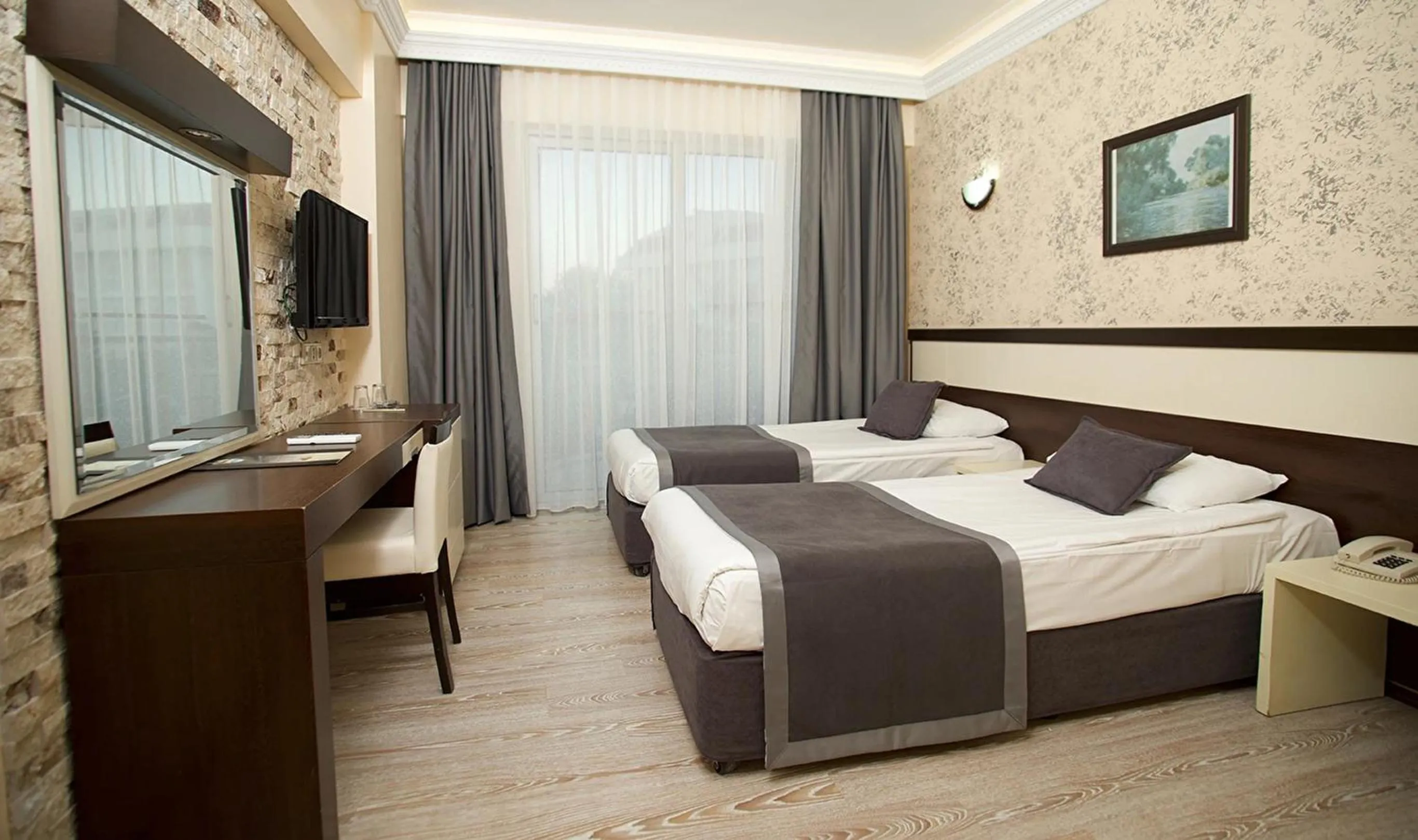 Bed in Camyuva Beach Hotel