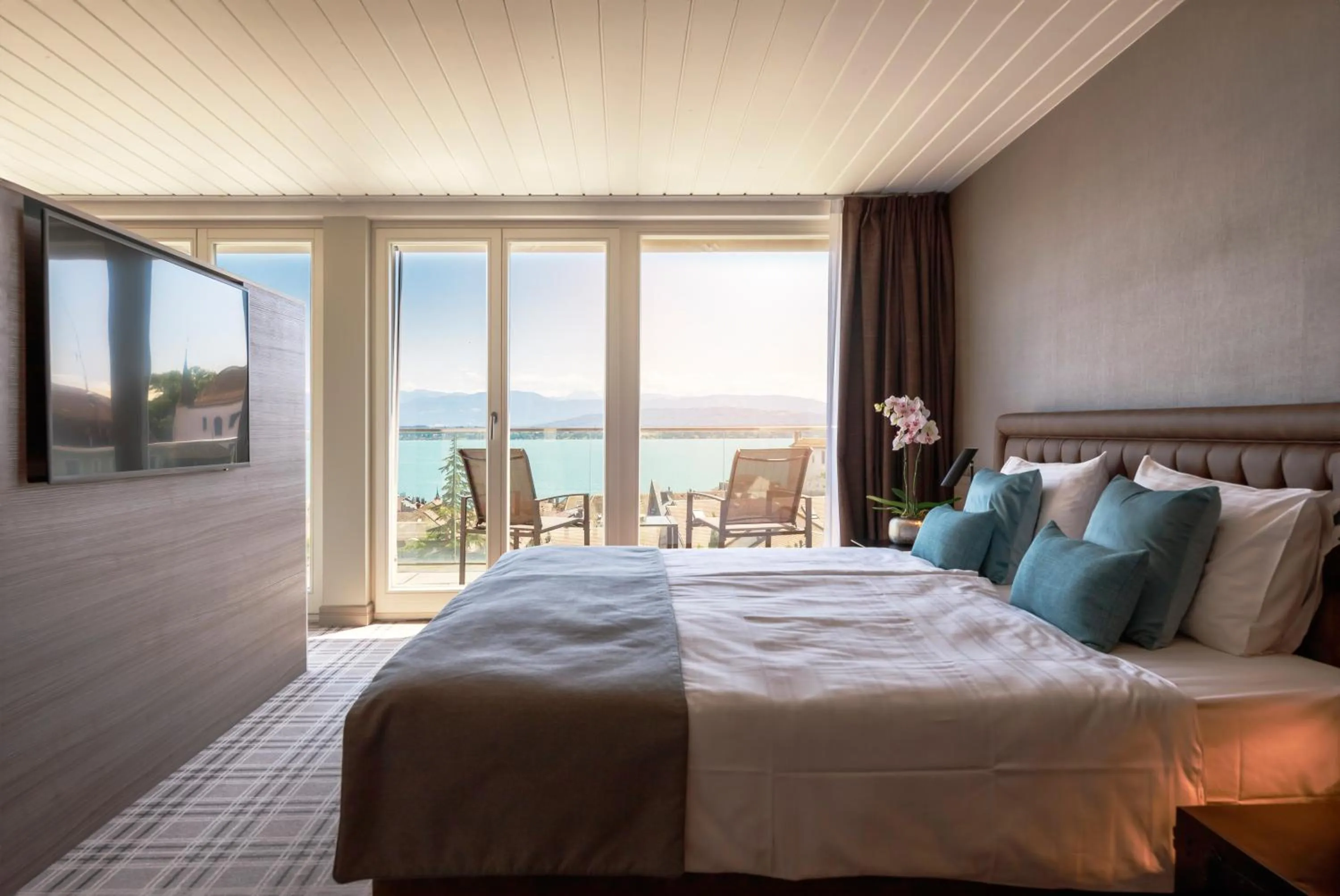 Bed in Ambassador Boutique Hotel