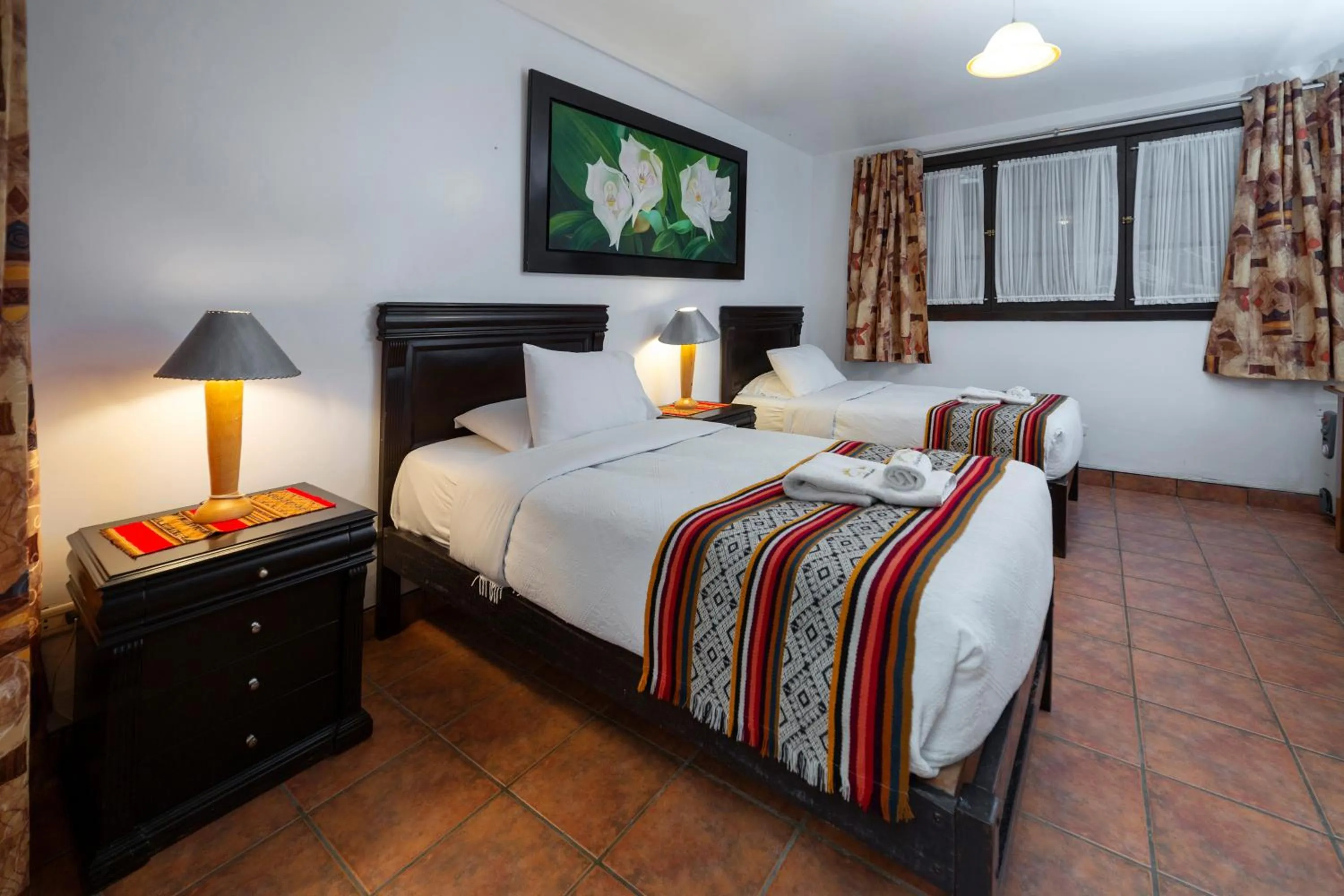 Bed in Gringo Bill's Boutique Hotel