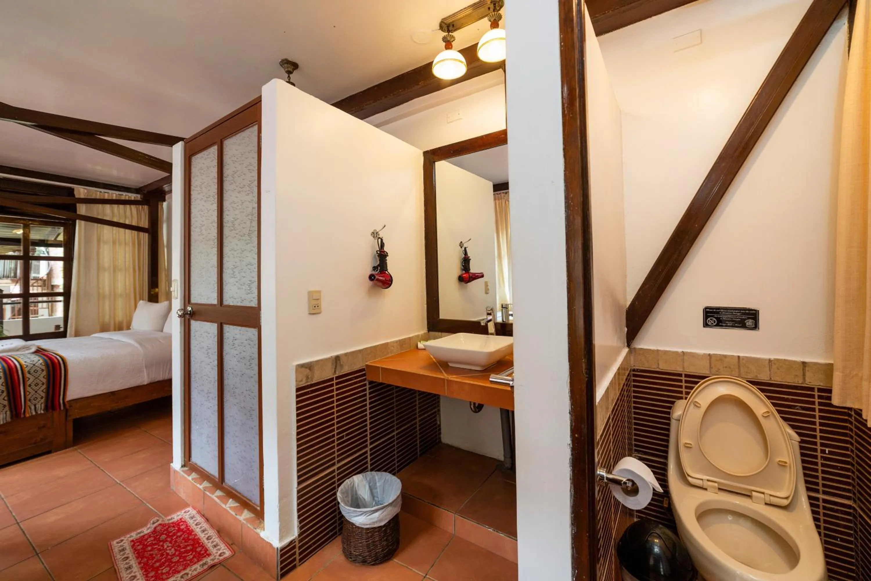 Bed in Gringo Bill's Boutique Hotel