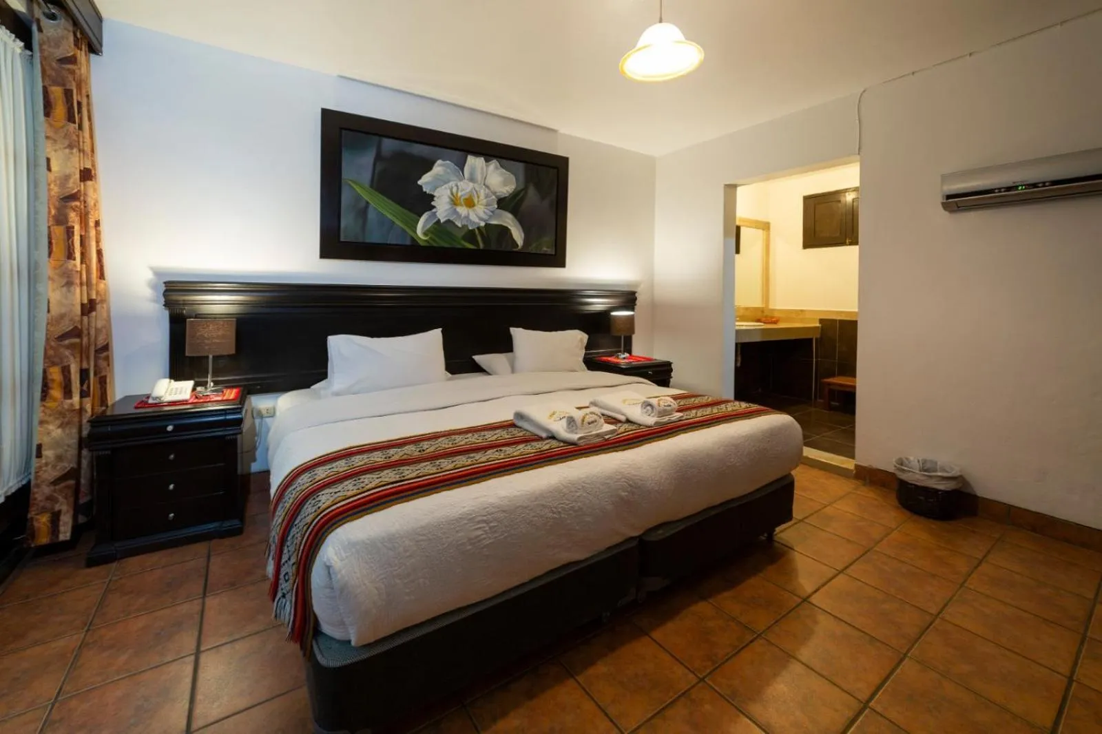 Bed in Gringo Bill's Boutique Hotel