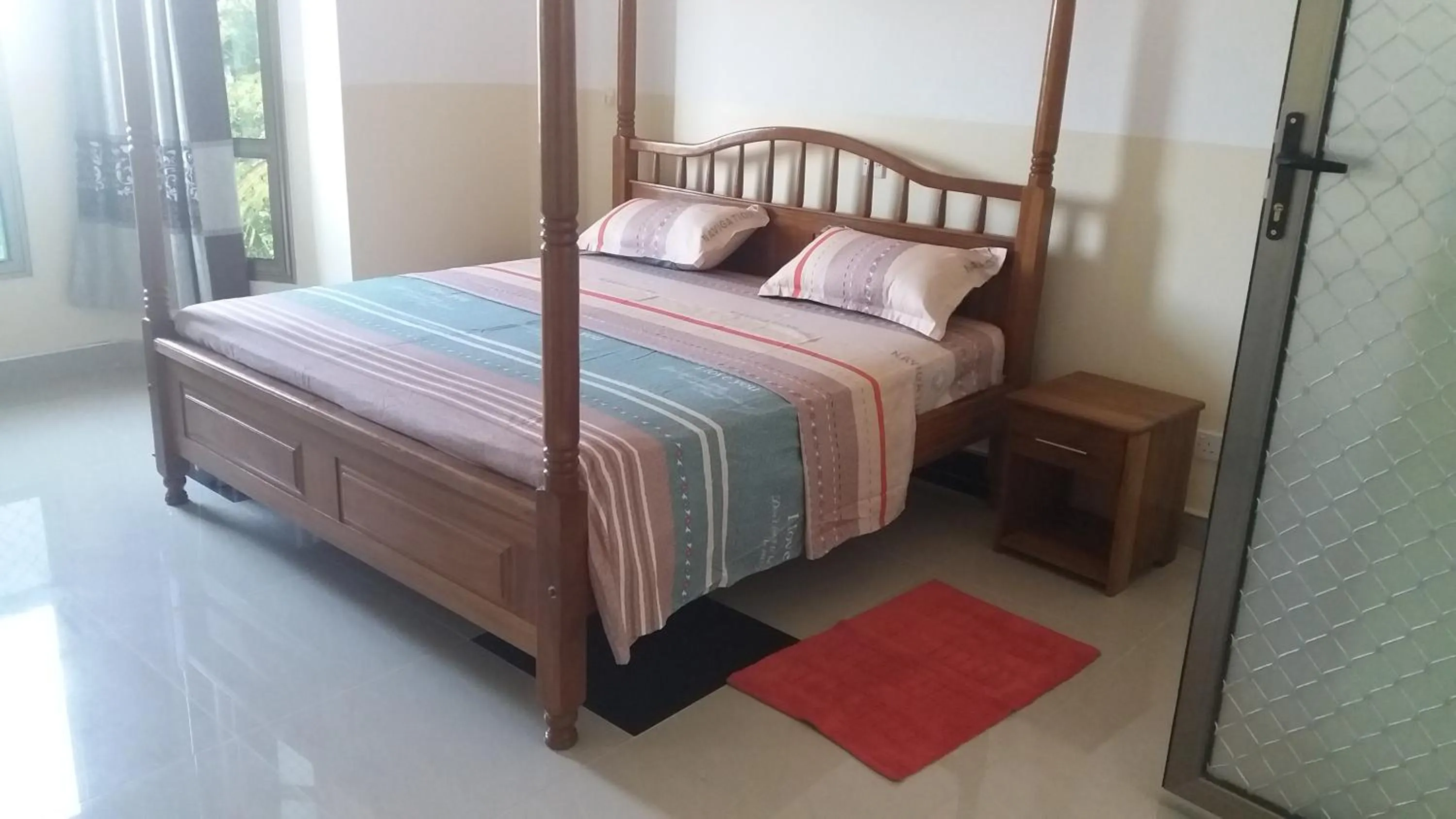 Bed in Ayodya Suites Nyali