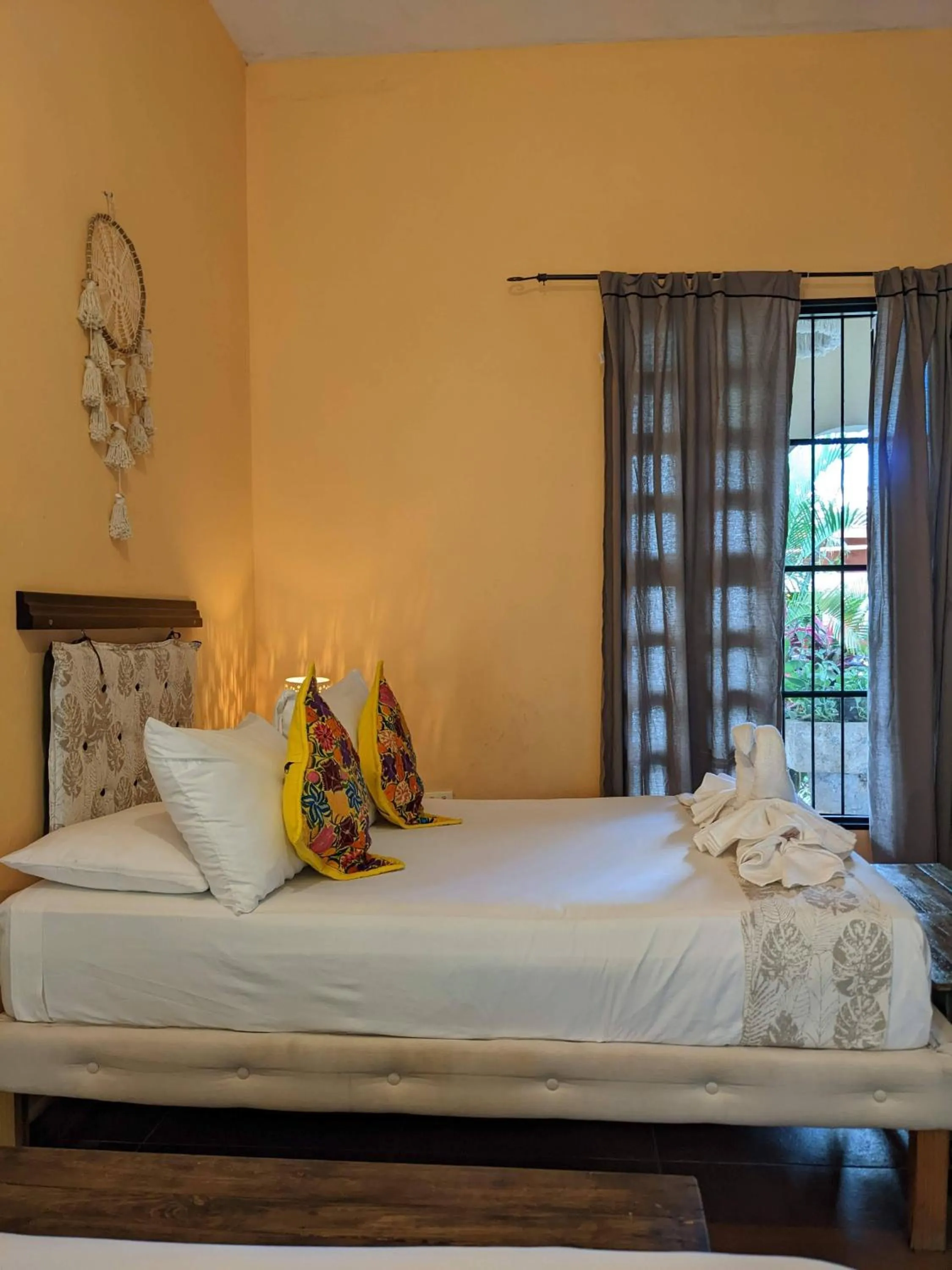 Bed in Casa Aluxes Hotel