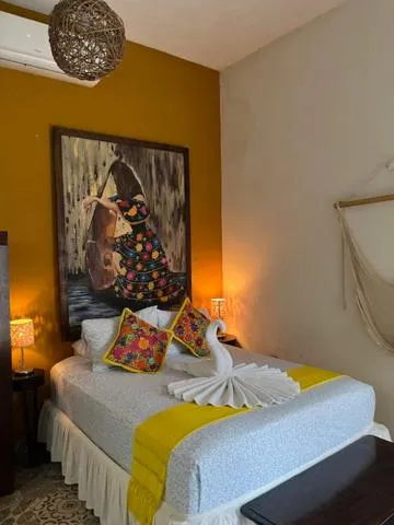 Bed in Casa Aluxes Hotel