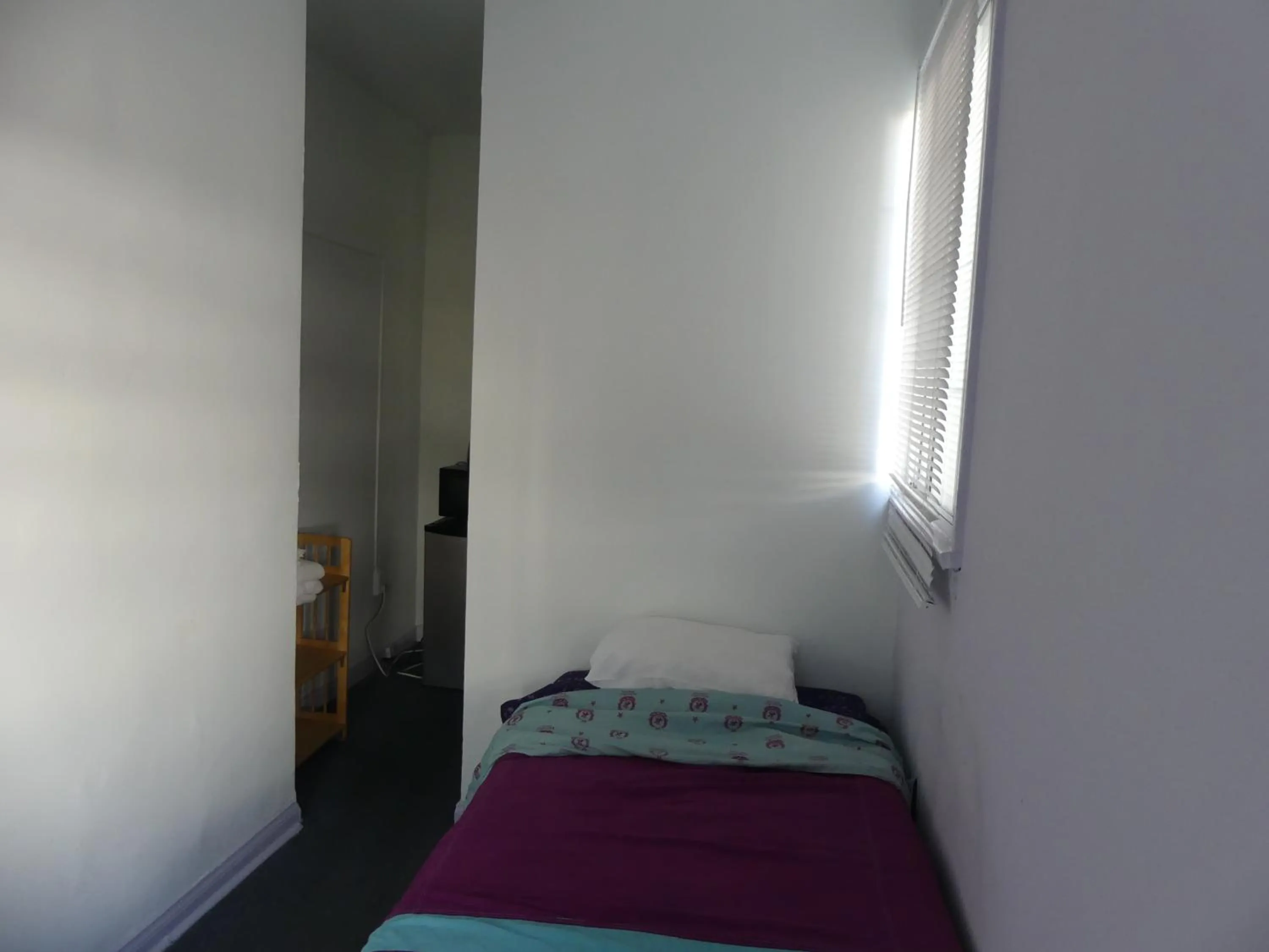 Bed in Wilshire Orange Hotel