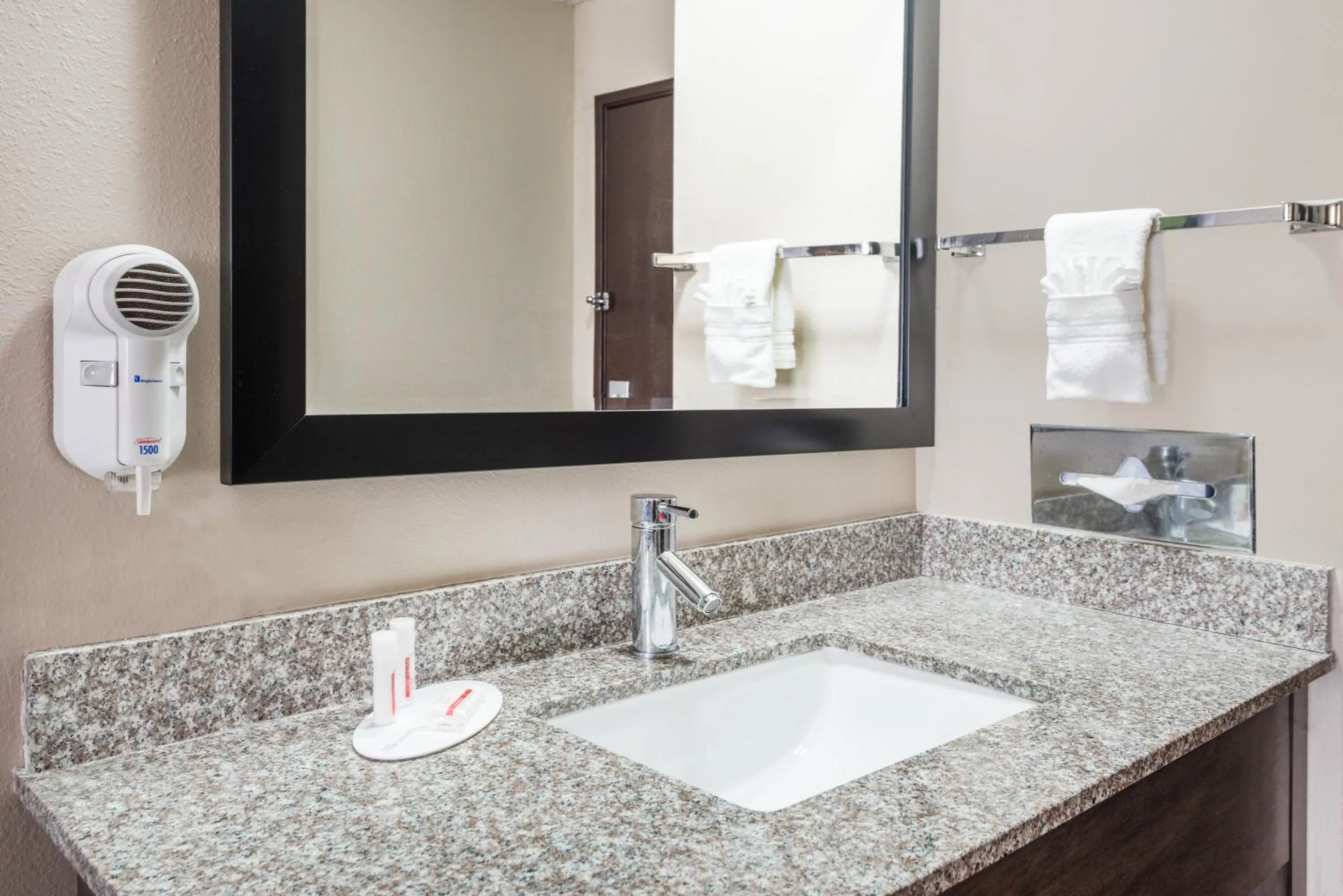 Bathroom in Super 8 by Wyndham Warrensburg