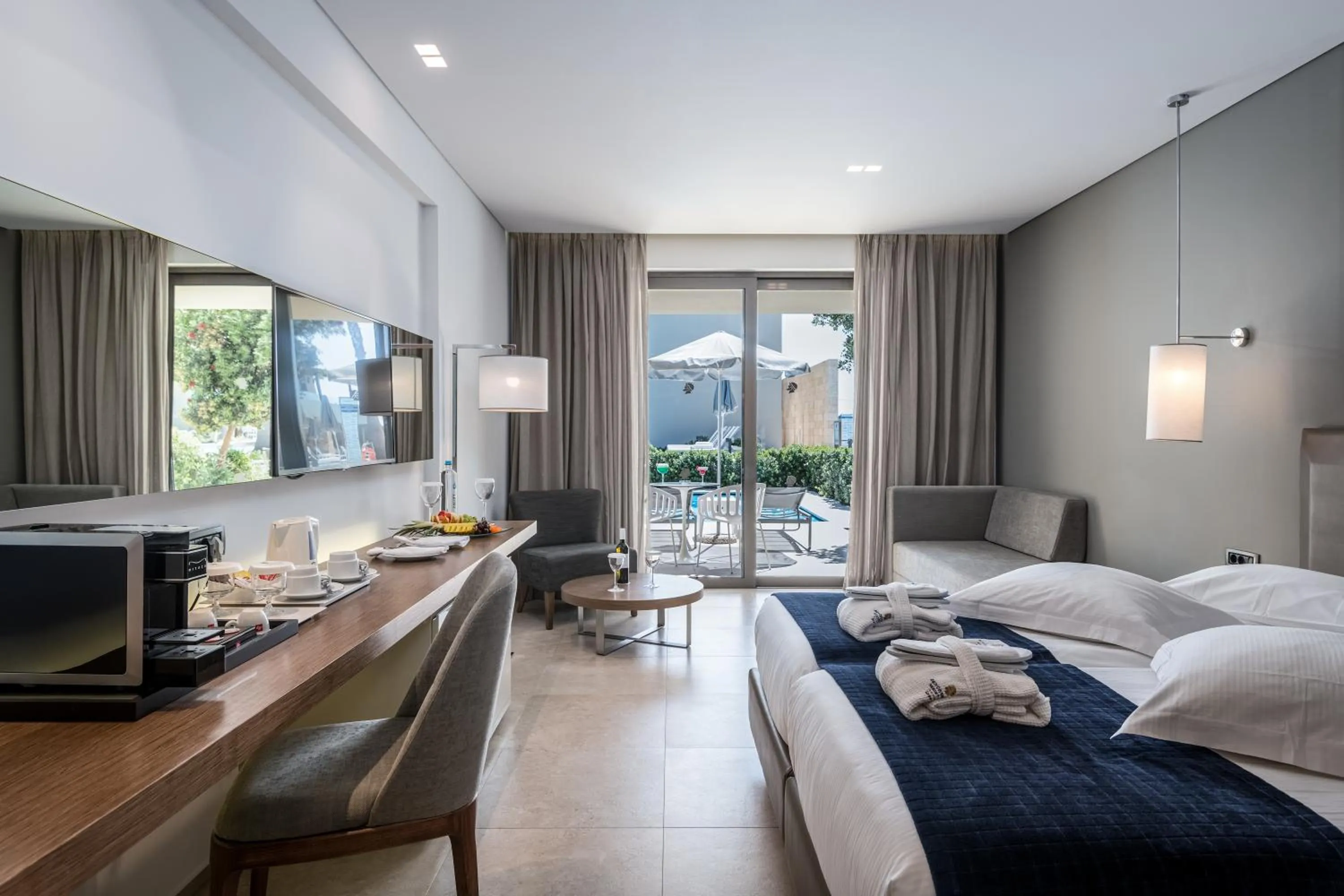 TV and multimedia, Bed in Astir Odysseus Kos Resort and Spa