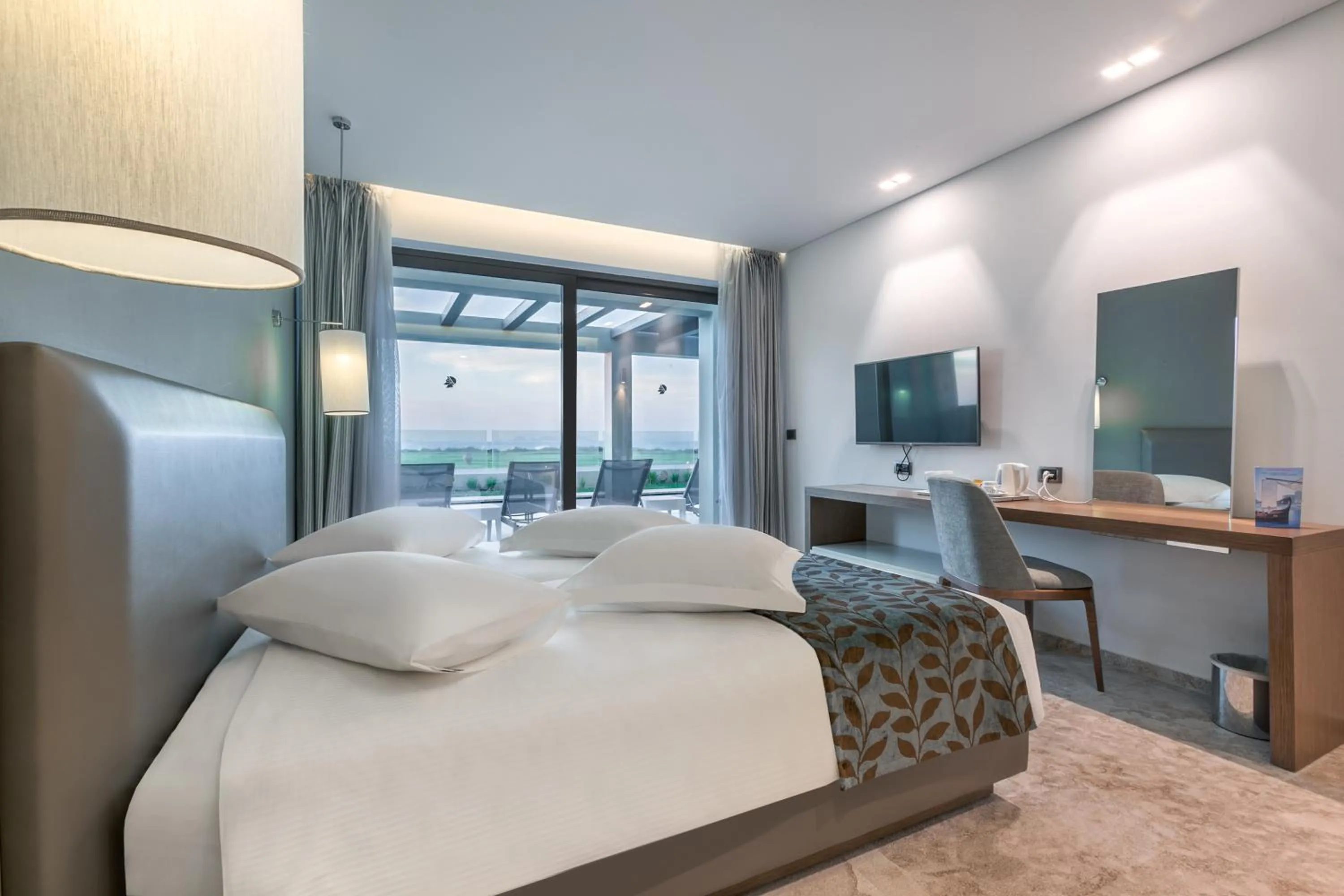 TV and multimedia, Bed in Astir Odysseus Kos Resort and Spa