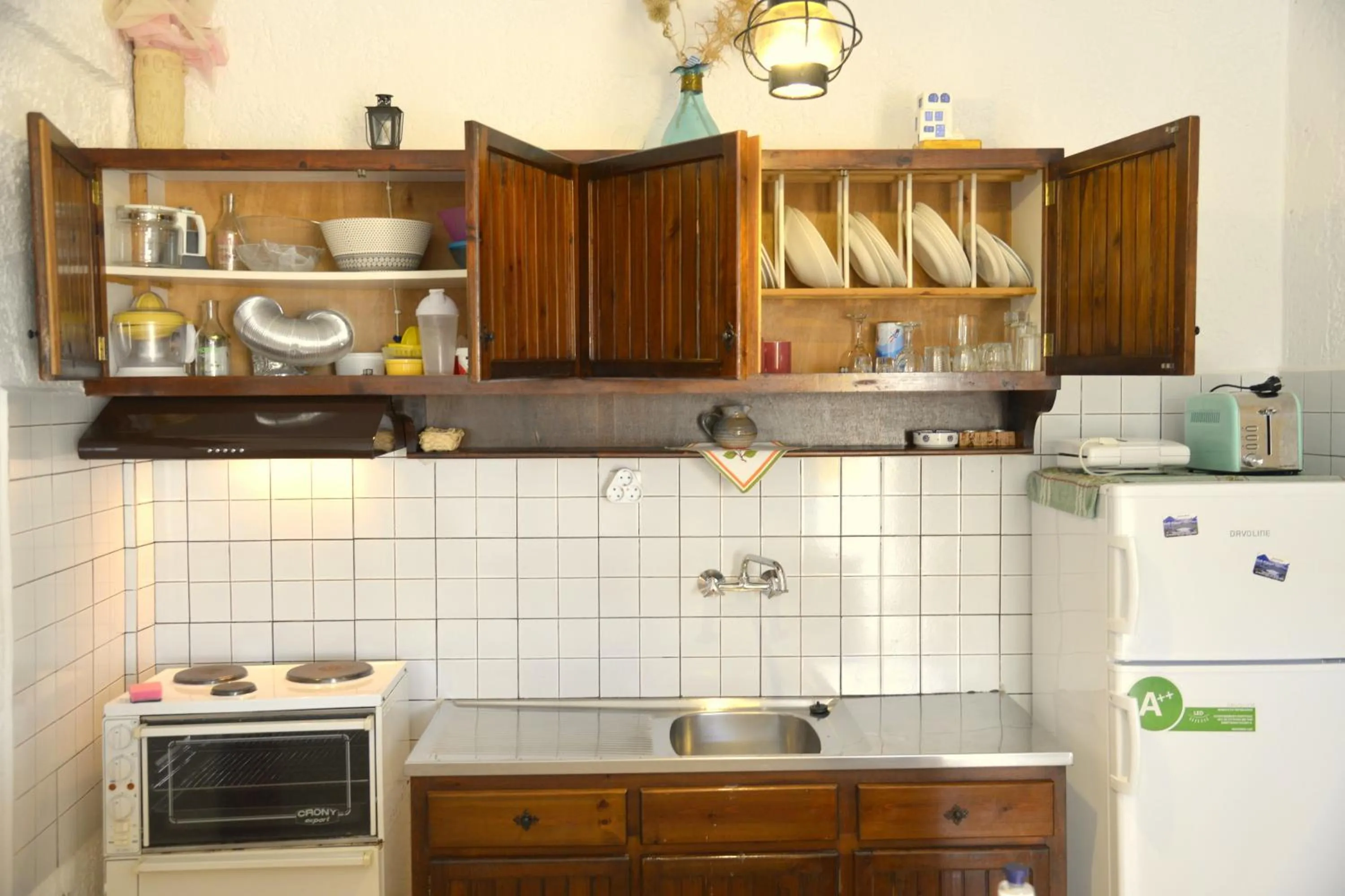 Kitchen or kitchenette in Filoxenia Villa