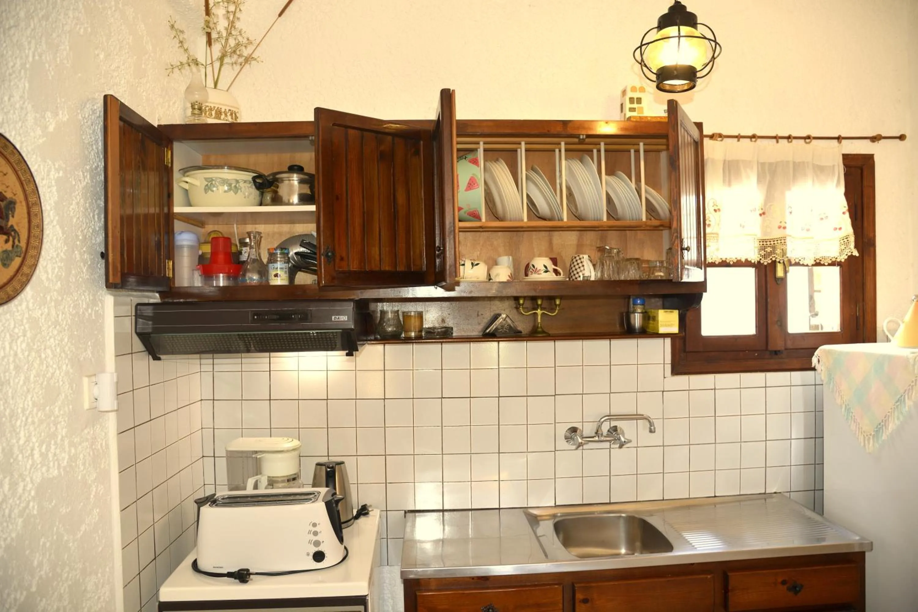 Kitchen or kitchenette in Filoxenia Villa