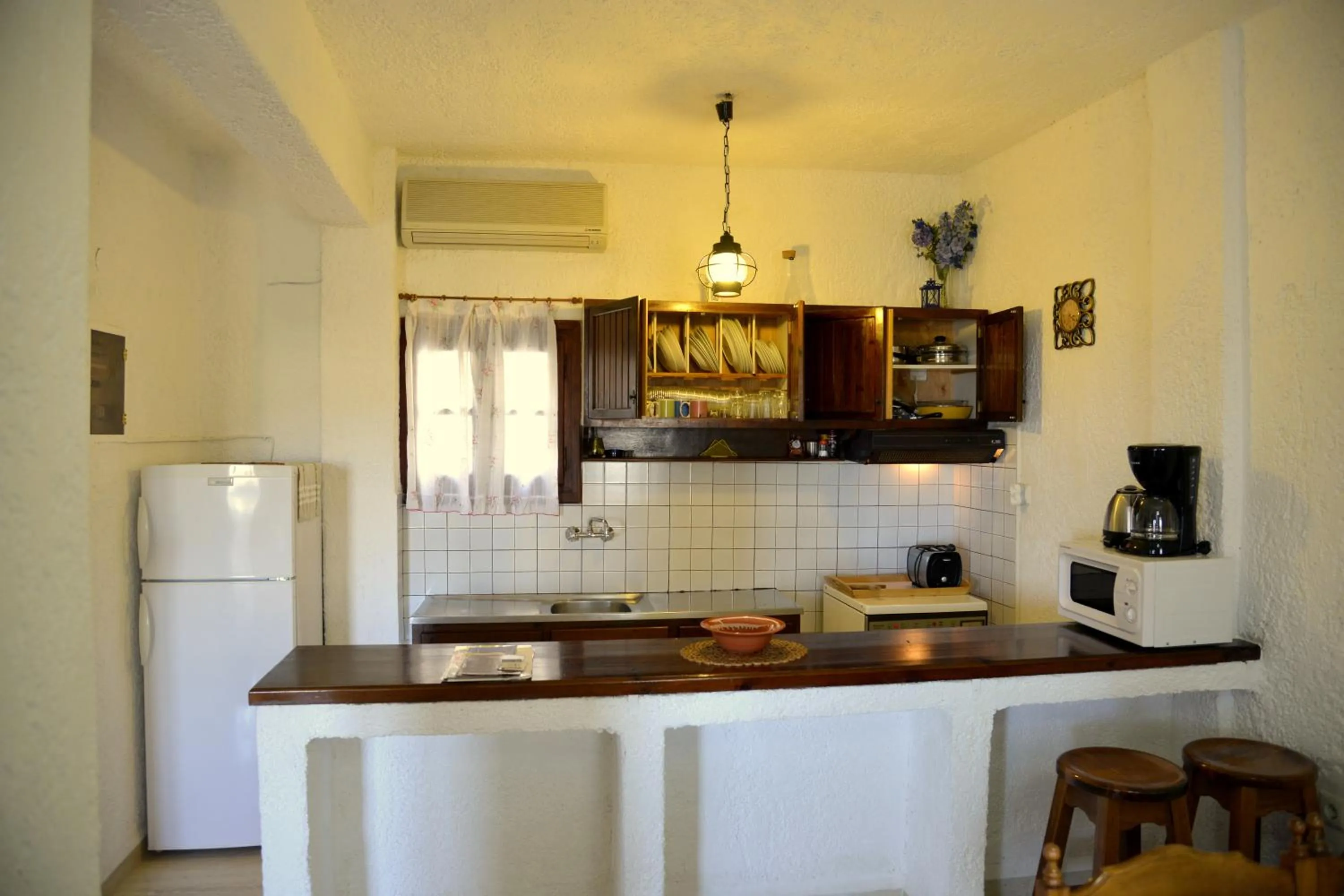 Kitchen or kitchenette in Filoxenia Villa