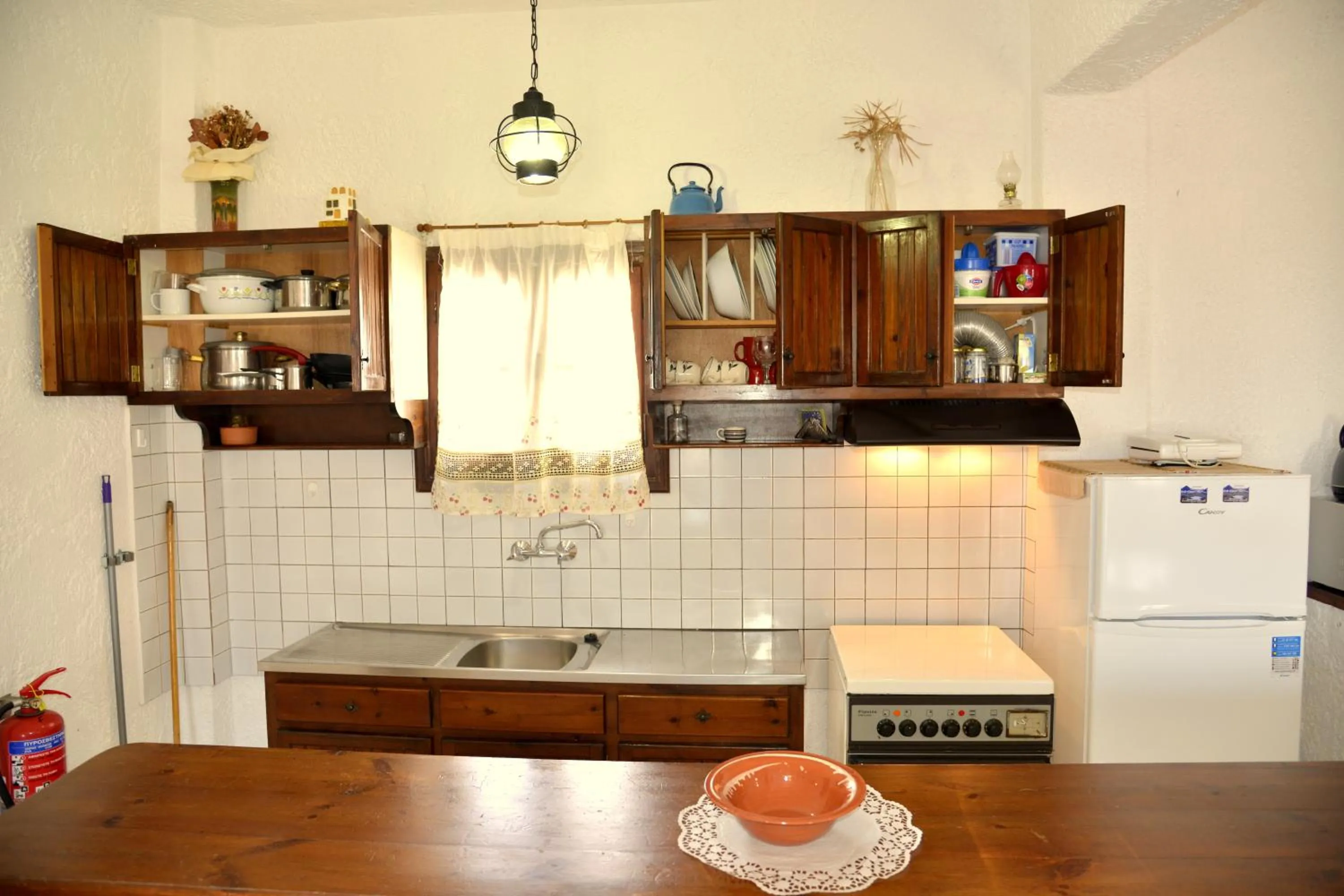 Kitchen or kitchenette in Filoxenia Villa