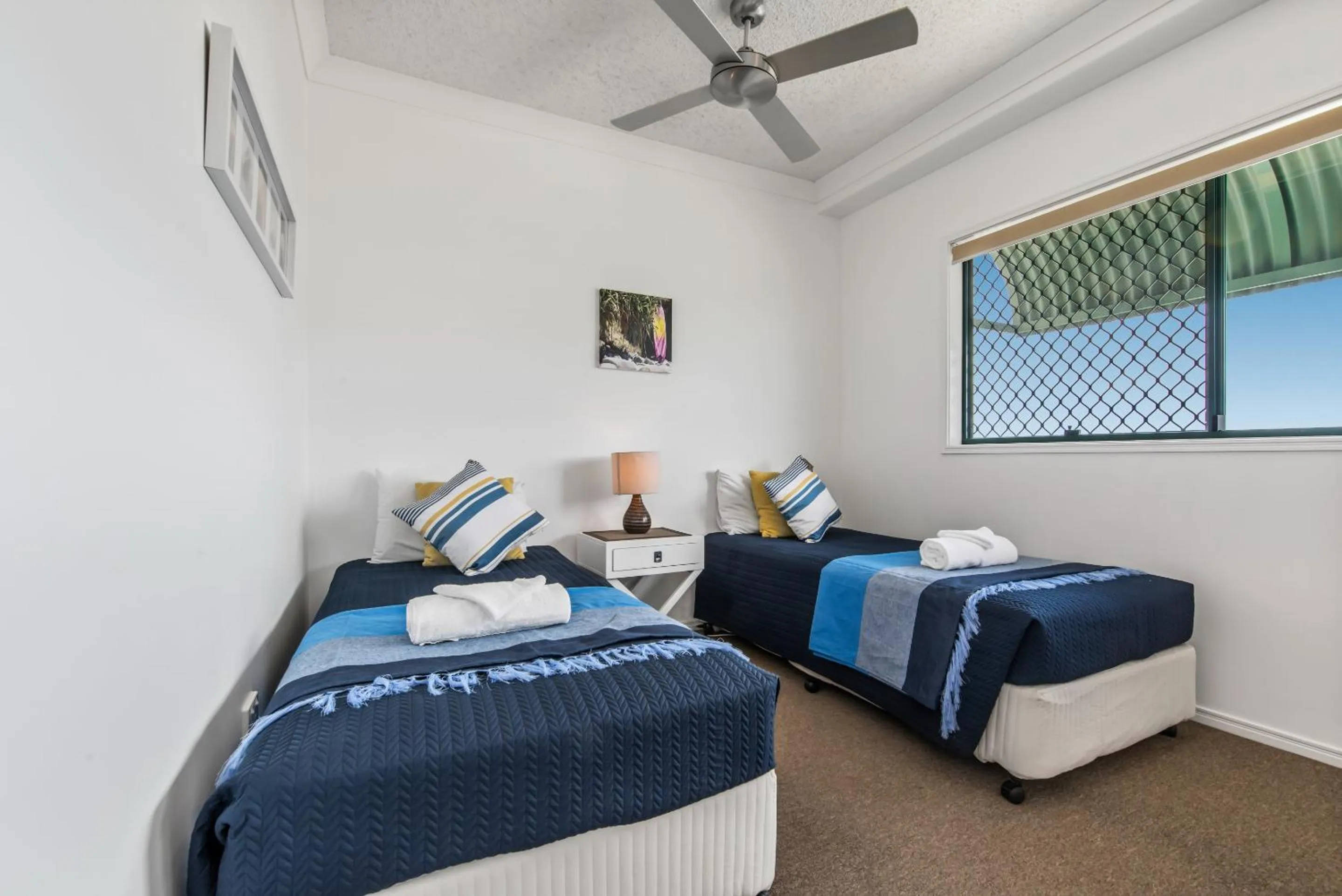 Bed in Sunshine Towers Boutique Apartments