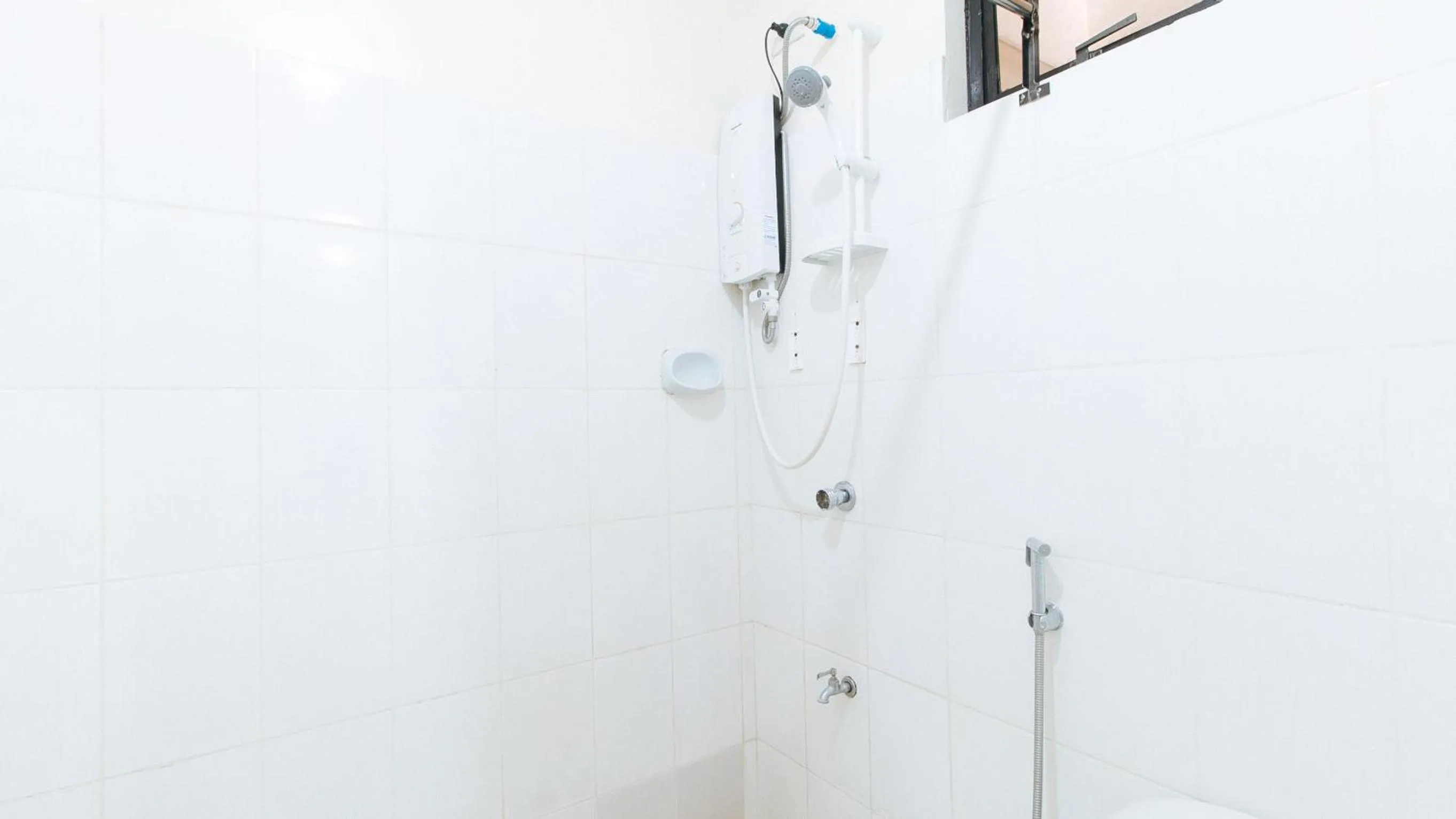 Shower in RedDoorz near Bambang Station