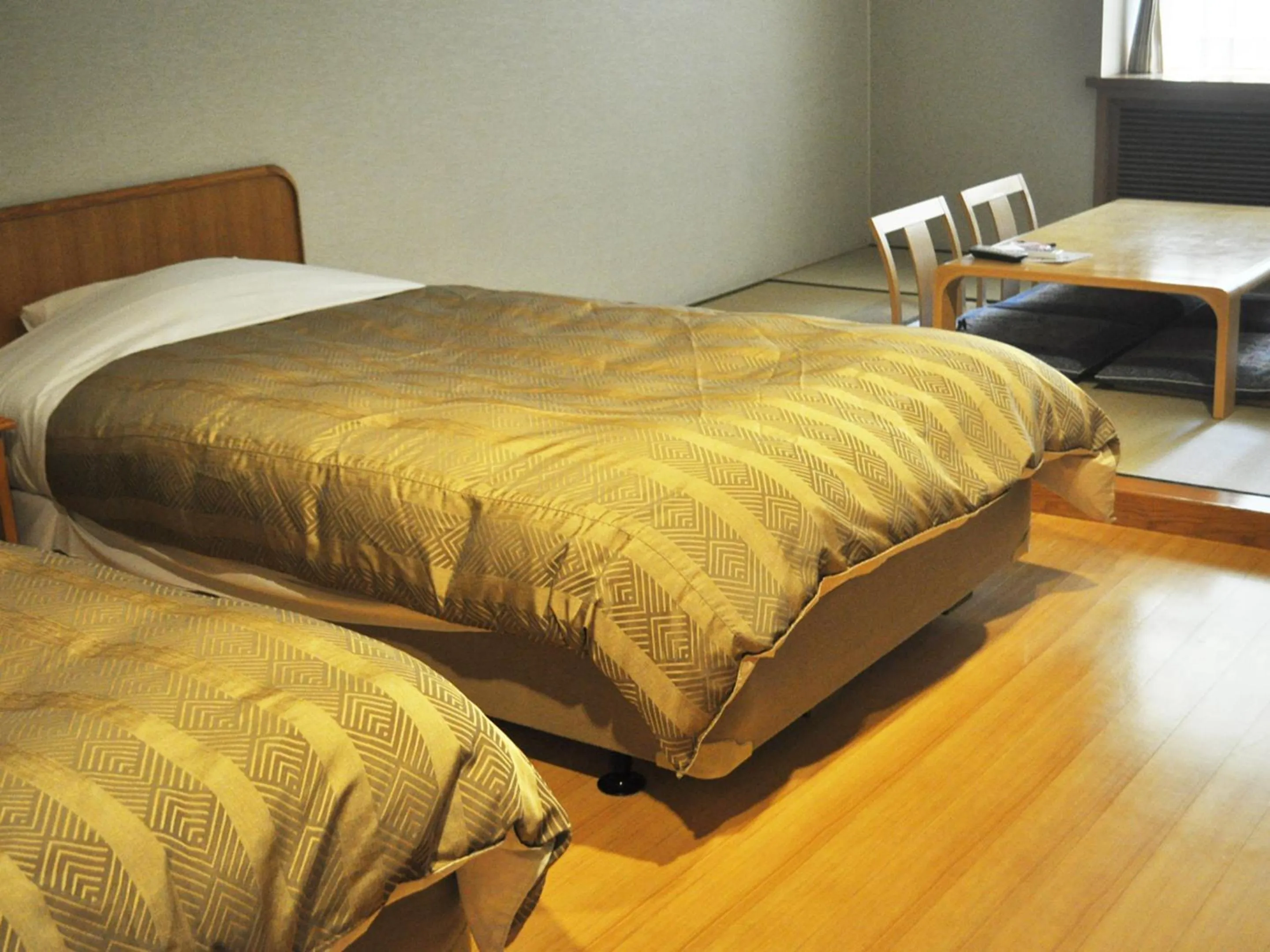 Photo of the whole room, Bed in Megahira Onsen Quelle Yoshiwa
