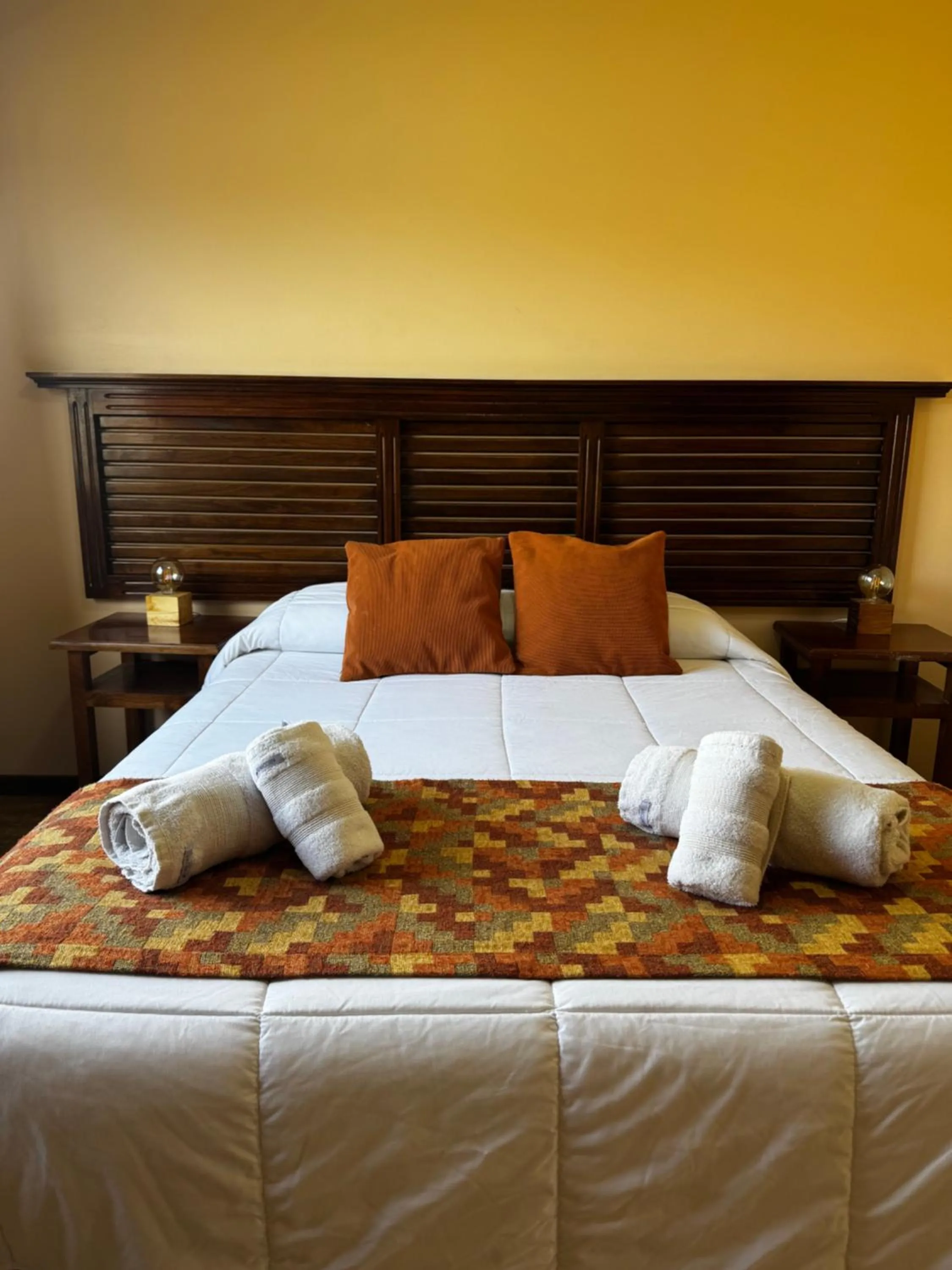 Bed in Patagonia Austral Suites
